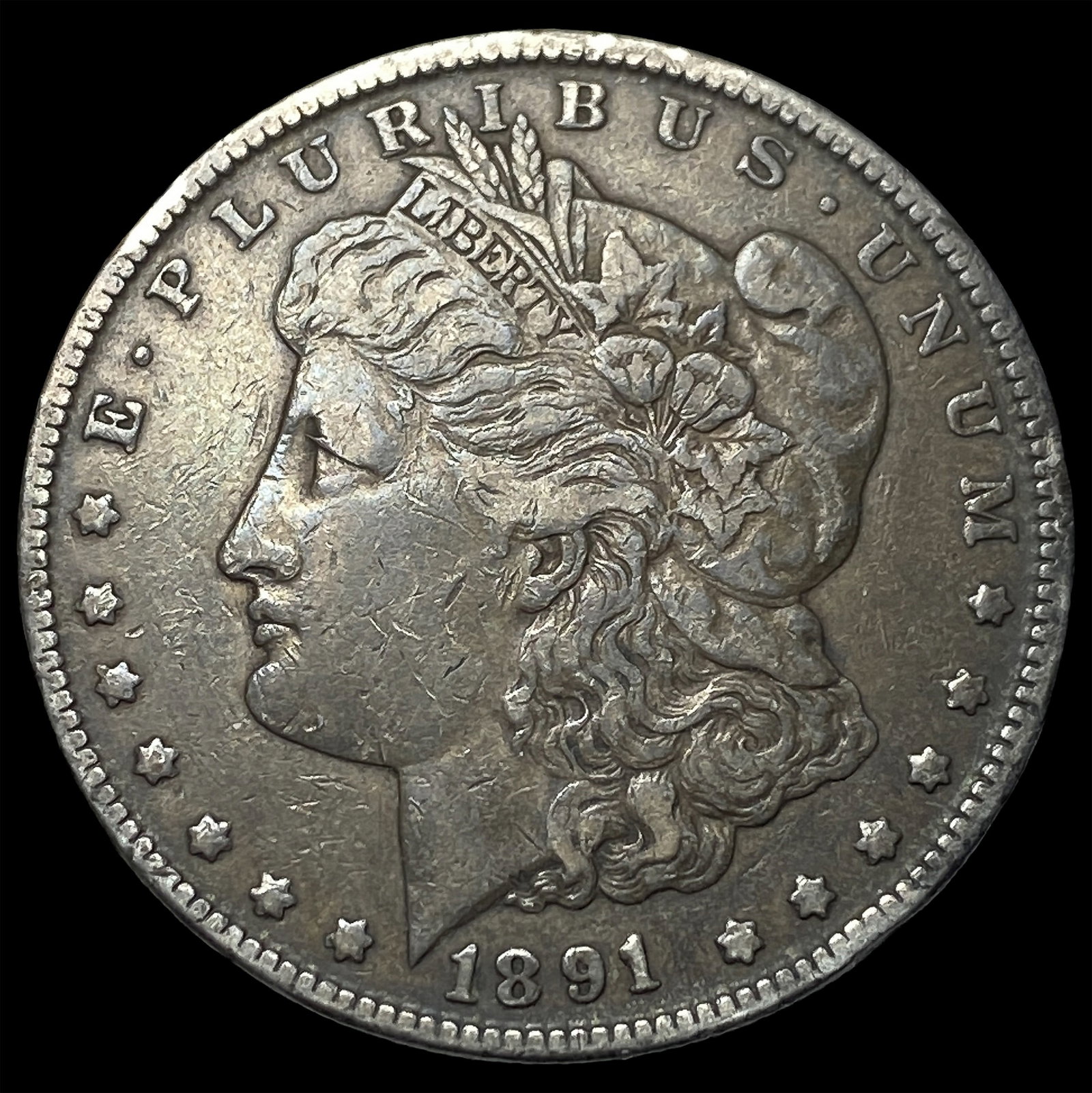 1891-CC Silver Morgan Dollar NEARLY UNCIRCULATED (1 of 2)