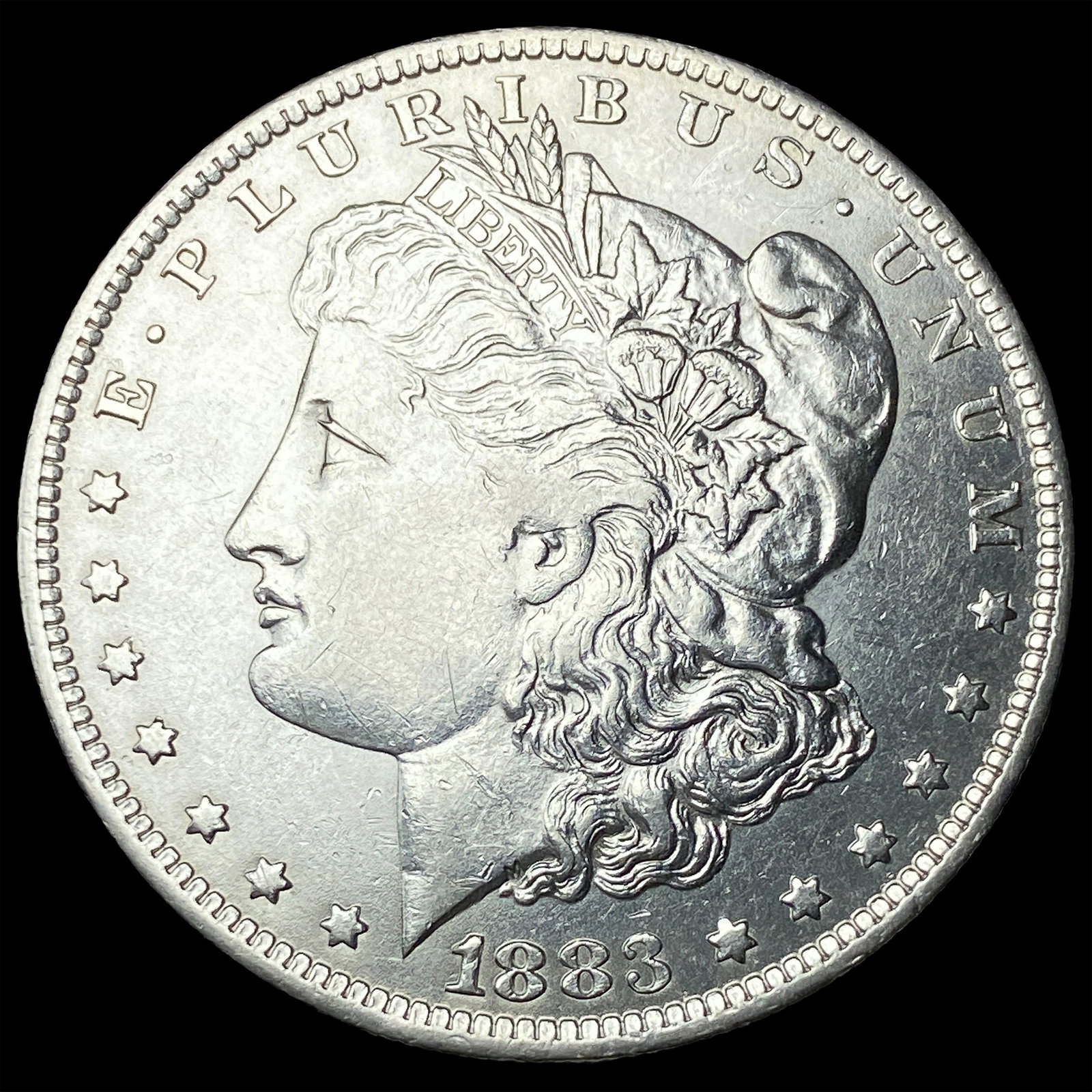 1883-O Silver Morgan Dollar CLOSELY UNCIRCULATED (1 of 2)