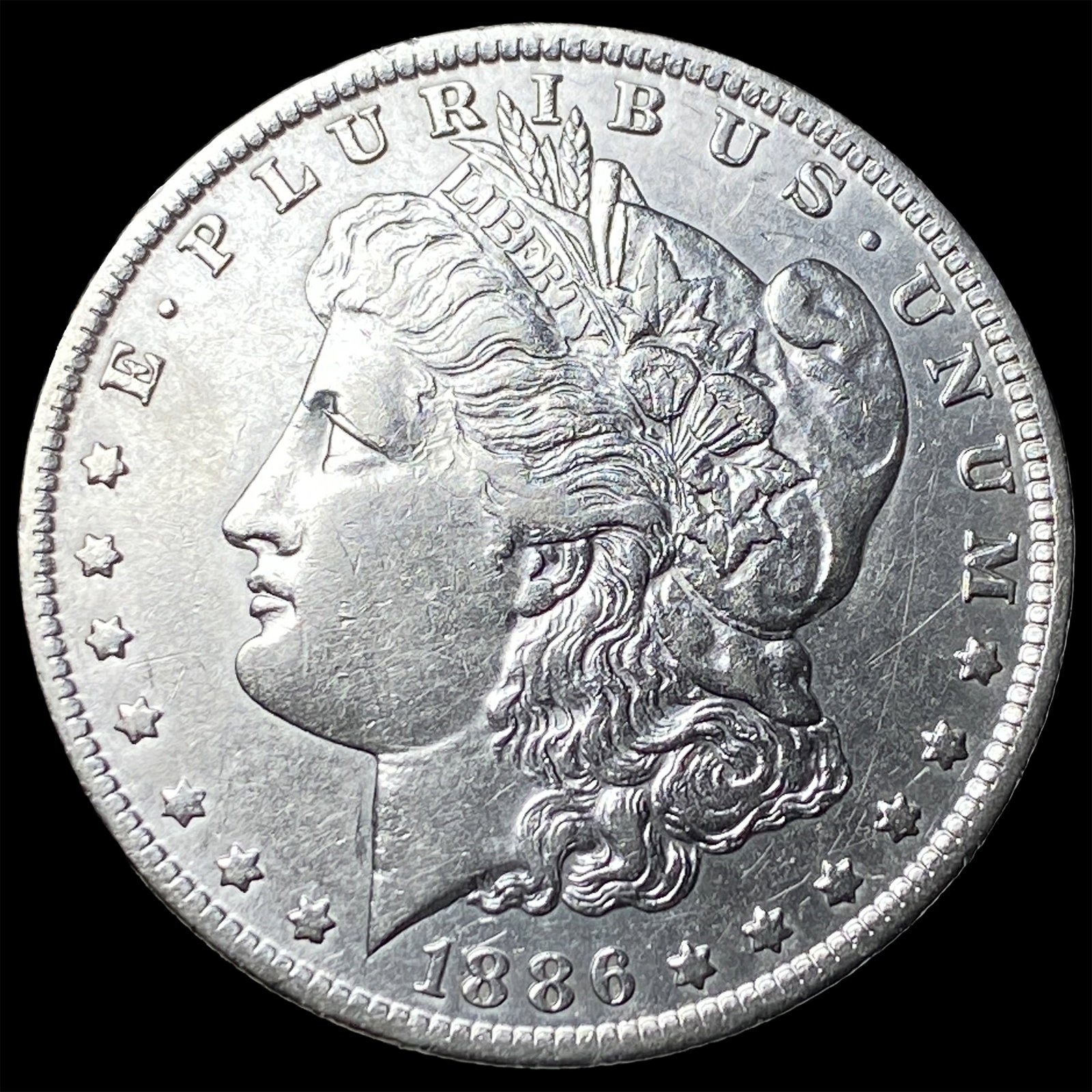 1886-O Silver Morgan Dollar CLOSELY UNCIRCULATED: 1886-O Silver Morgan Dollar CLOSELY UNCIRCULATED
