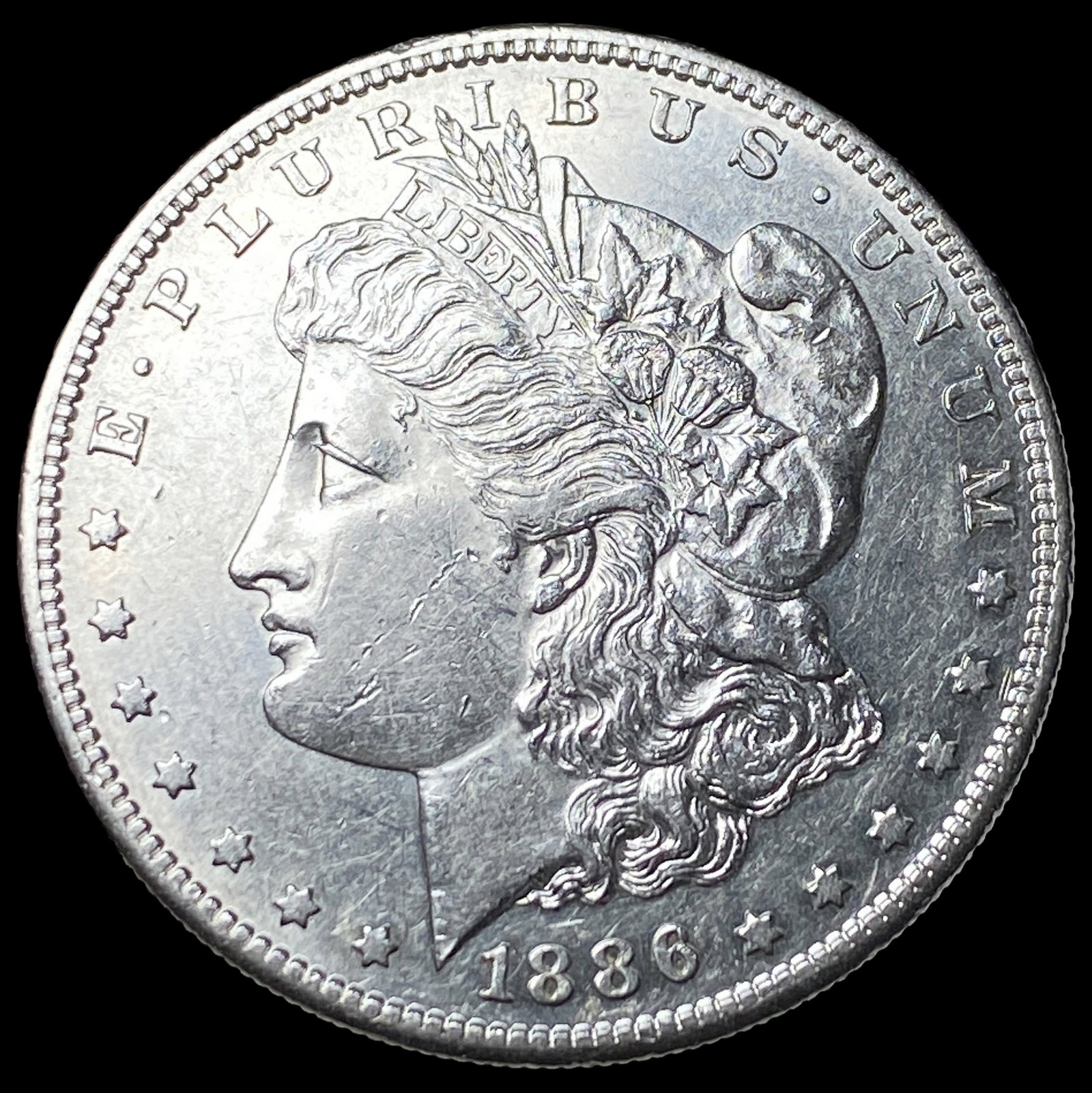 1886-S Morgan Silver Dollar CLOSELY UNCIRCULATED (1 of 2)
