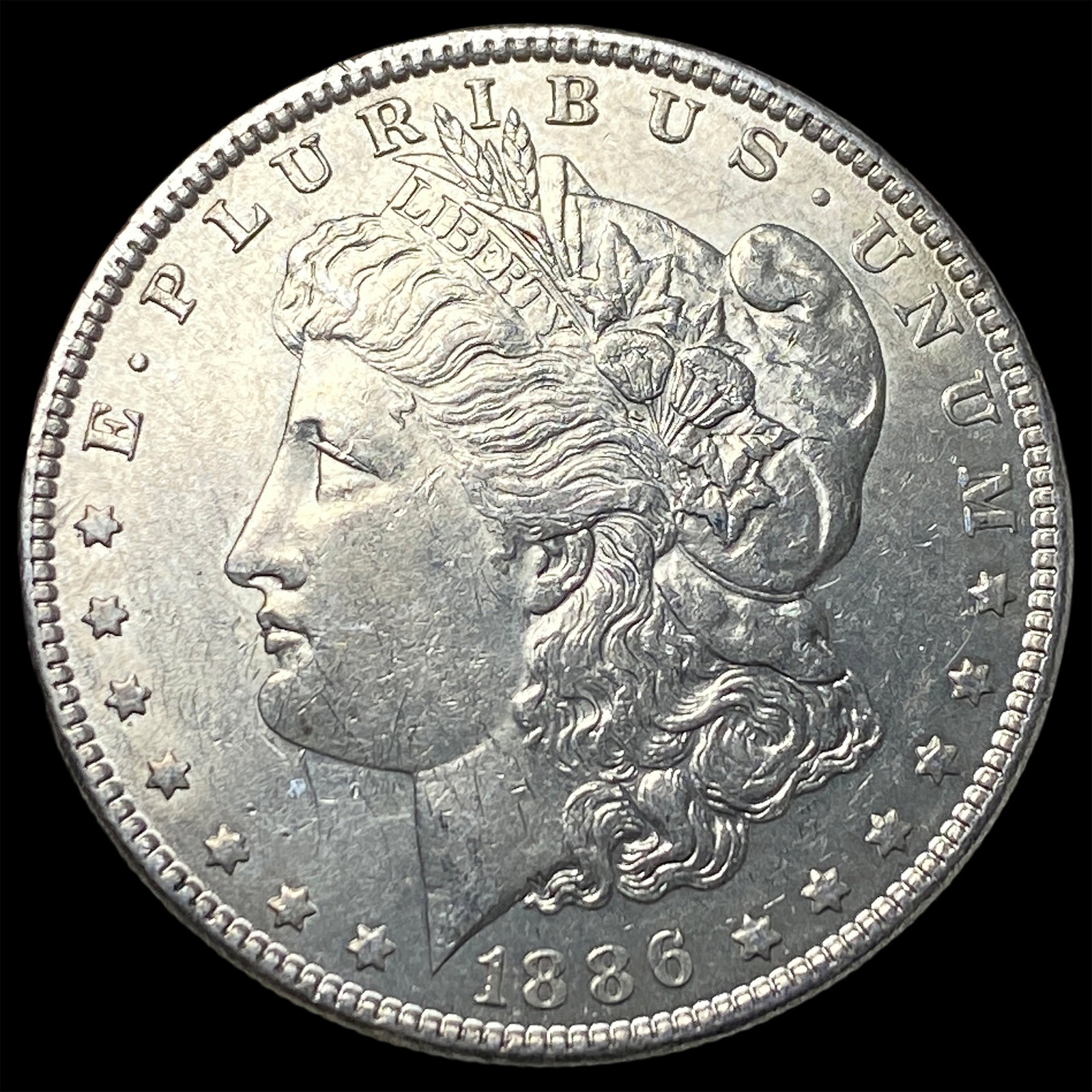 1886 Morgan Silver Dollar CLOSELY UNCIRCULATED: 1886 Morgan Silver Dollar CLOSELY UNCIRCULATED