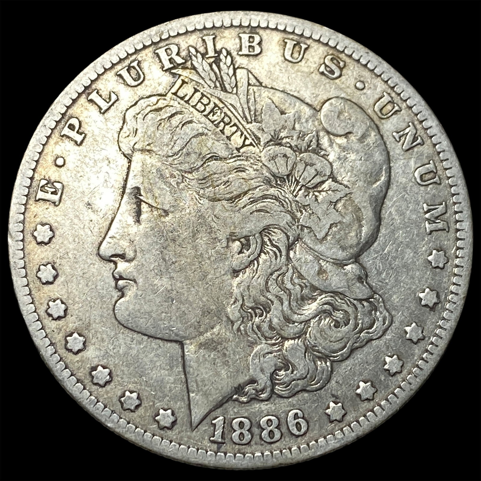 1886-O Silver Morgan Dollar ABOUT UNCIRCULATED (1 of 2)
