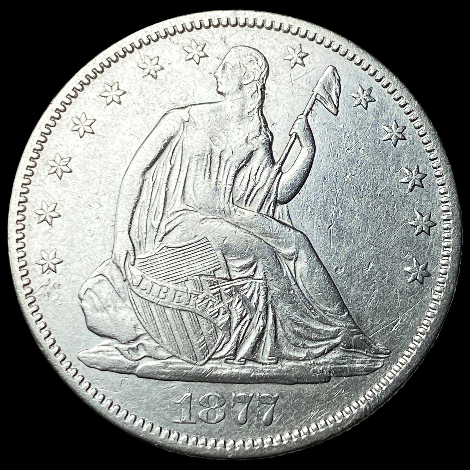 1877-S Silver Seated Liberty Half Dollar NEARLY UNCIRCULATED: 1877-S Silver Seated Liberty Half Dollar NEARLY UNCIRCULATED