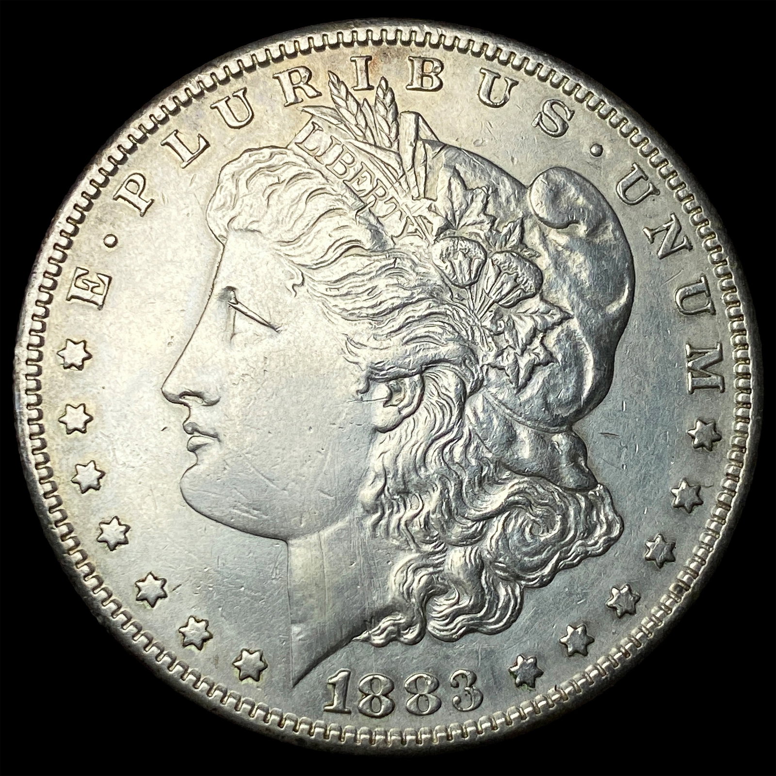 1883-S Silver Morgan Dollar CLOSELY UNCIRCULATED (1 of 2)