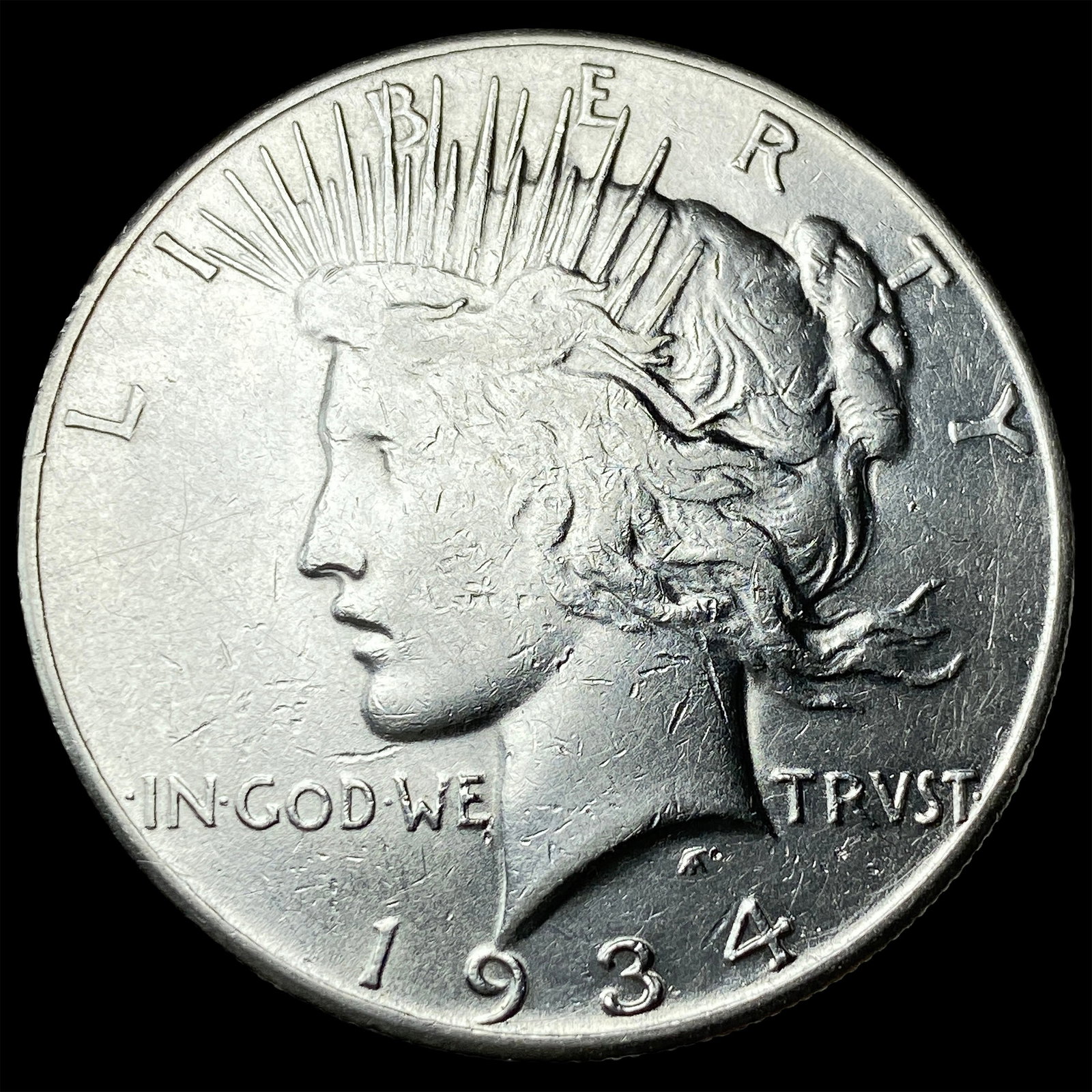 1934 Peace Silver Dollar NEARLY UNCIRCULATED (1 of 2)