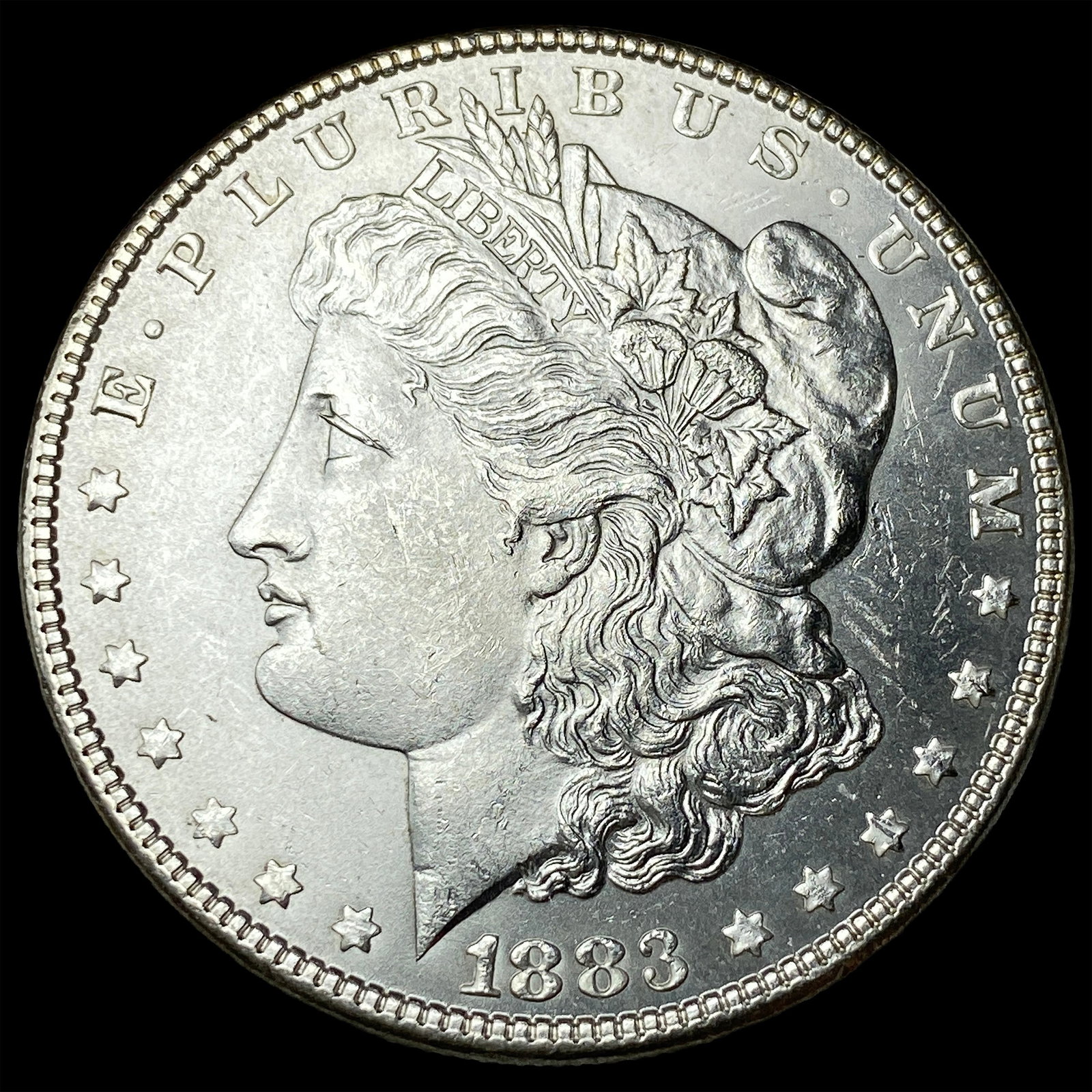 1883-S Silver Morgan Dollar ABOUT UNCIRCULATED: 1883-S Silver Morgan Dollar ABOUT UNCIRCULATED