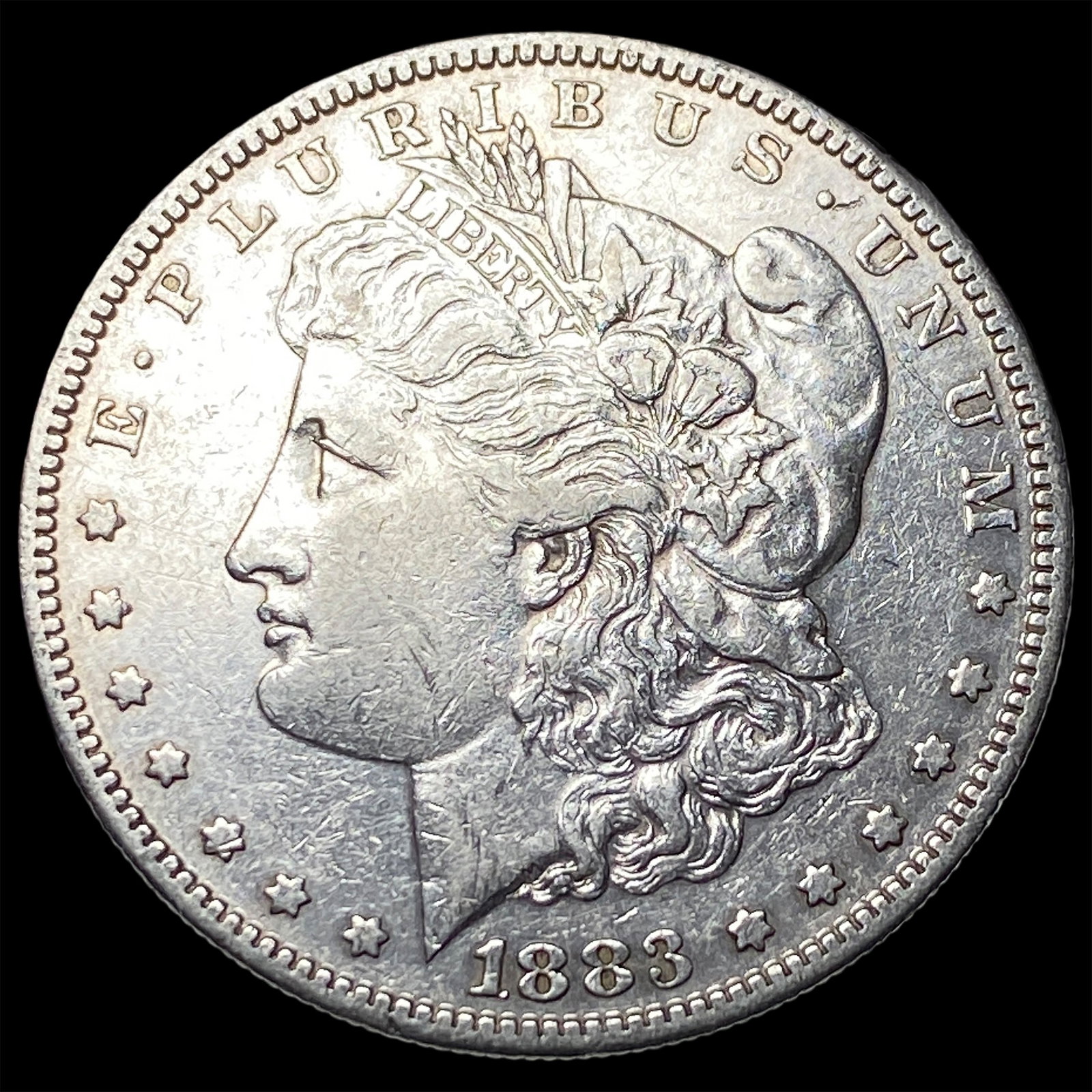 1883-S Silver Morgan Dollar CLOSELY UNCIRCULATED (1 of 2)