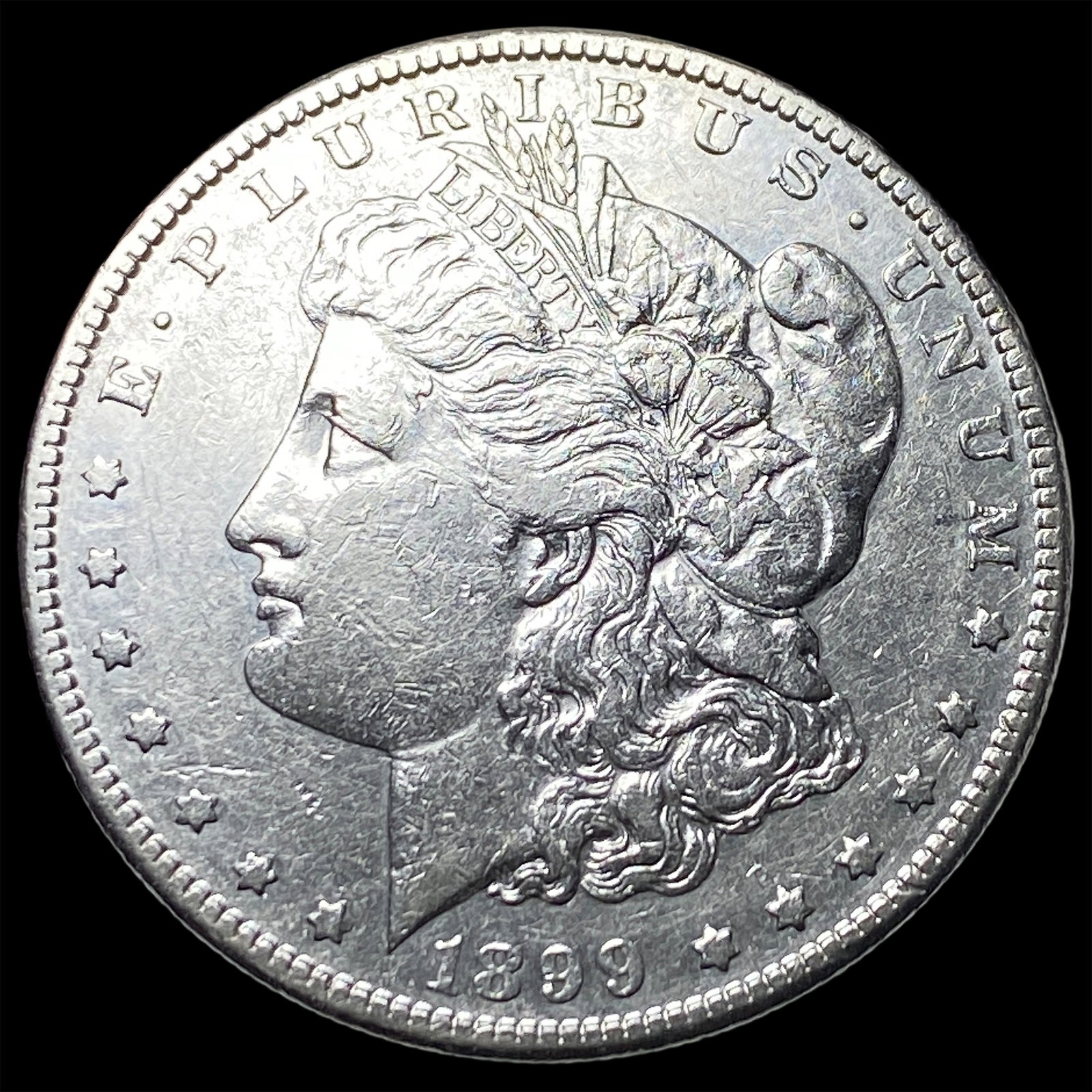1899 Silver Morgan Dollar NEARLY UNCIRCULATED: 1899 Silver Morgan Dollar NEARLY UNCIRCULATED
