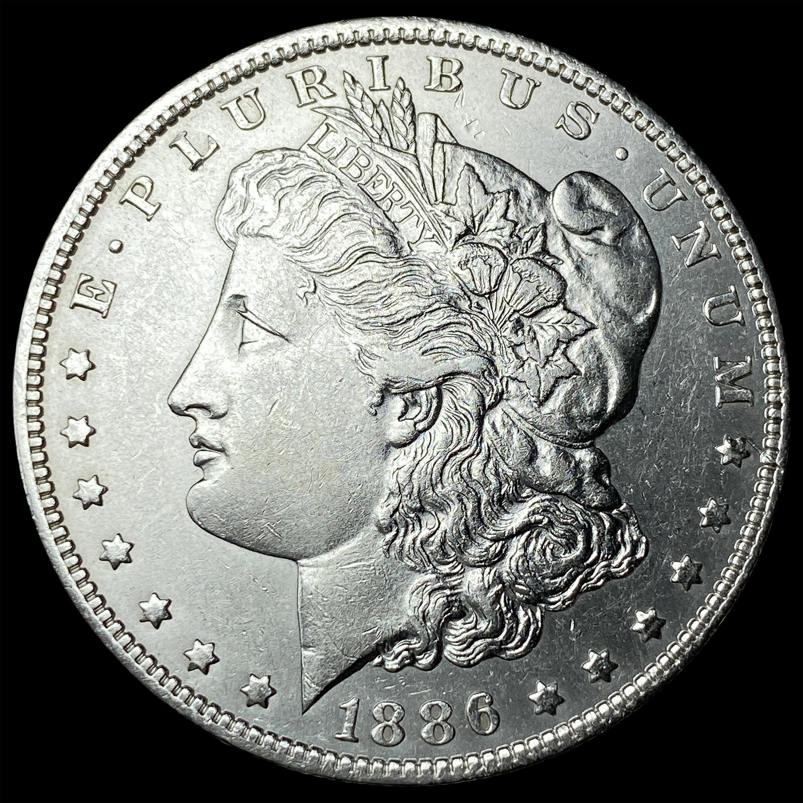 1886-O Silver Morgan Dollar CLOSELY UNCIRCULATED: 1886-O Silver Morgan Dollar CLOSELY UNCIRCULATED