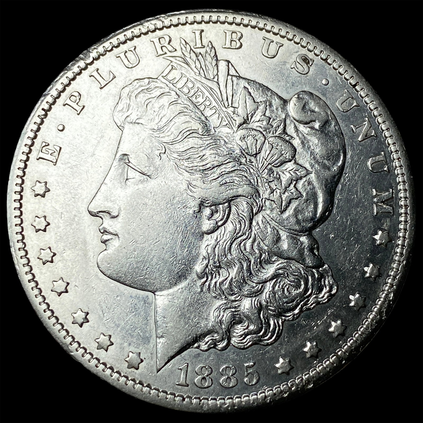 1885-CC Silver Morgan Dollar CLOSELY UNCIRCULATED: 1885-CC Silver Morgan Dollar CLOSELY UNCIRCULATED
