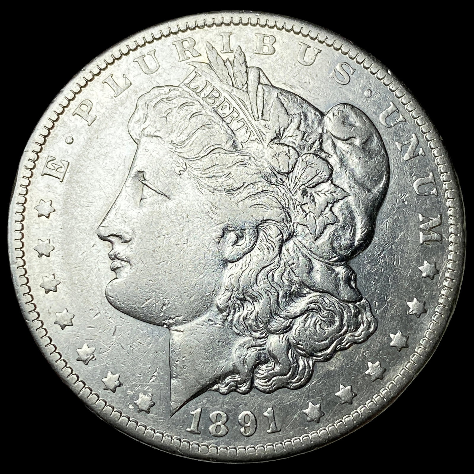 1891-CC Silver Morgan Dollar NEARLY UNCIRCULATED (1 of 2)
