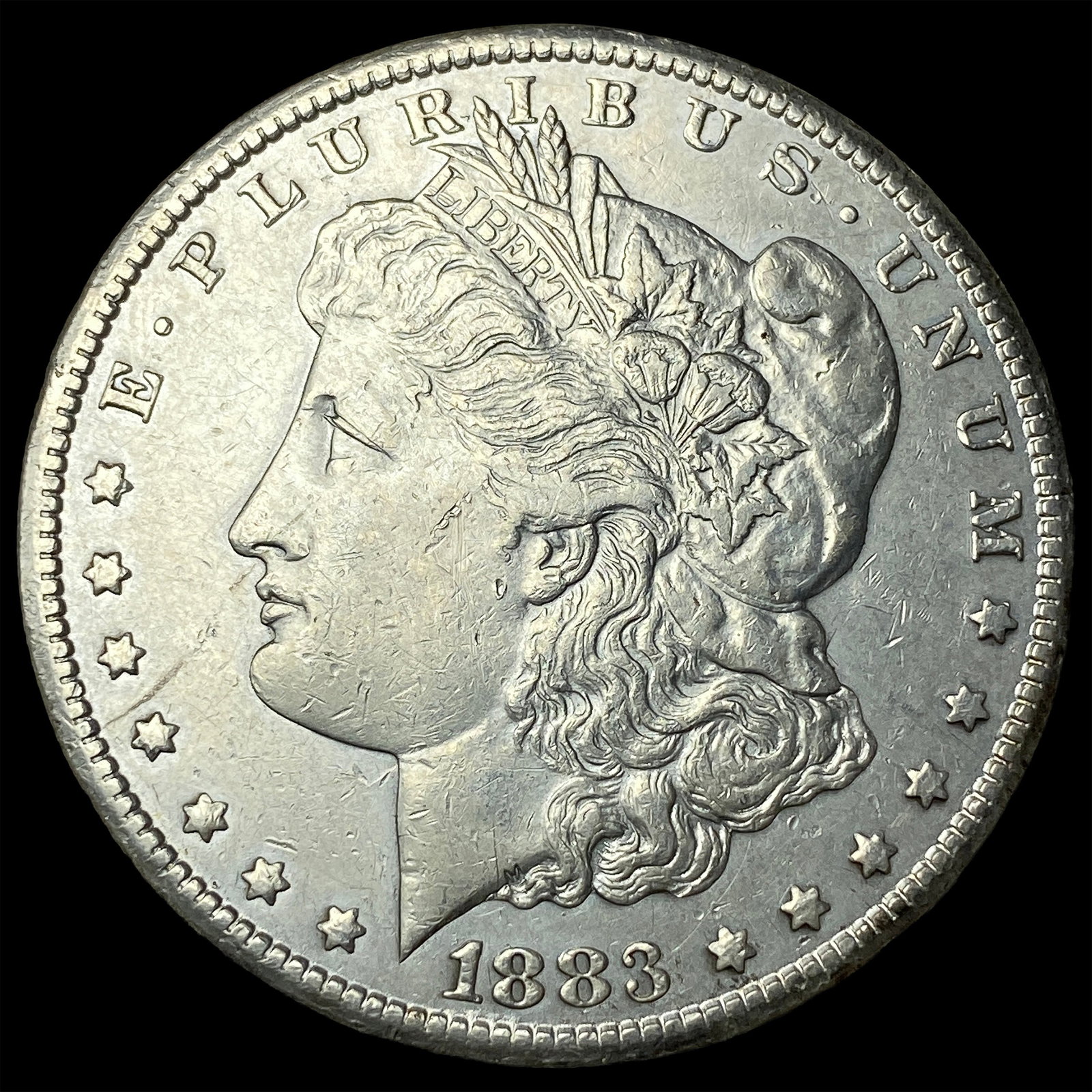1883-CC Silver Morgan Dollar NEARLY UNCIRCULATED (1 of 2)