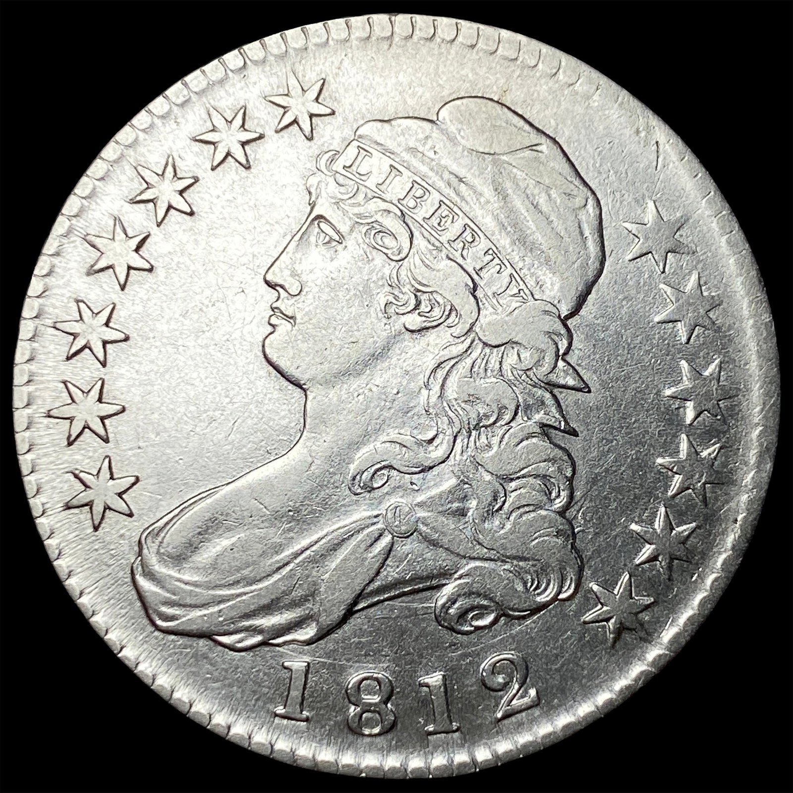 1812 Capped Bust Half Dollar NEARLY UNCIRCULATED (1 of 2)