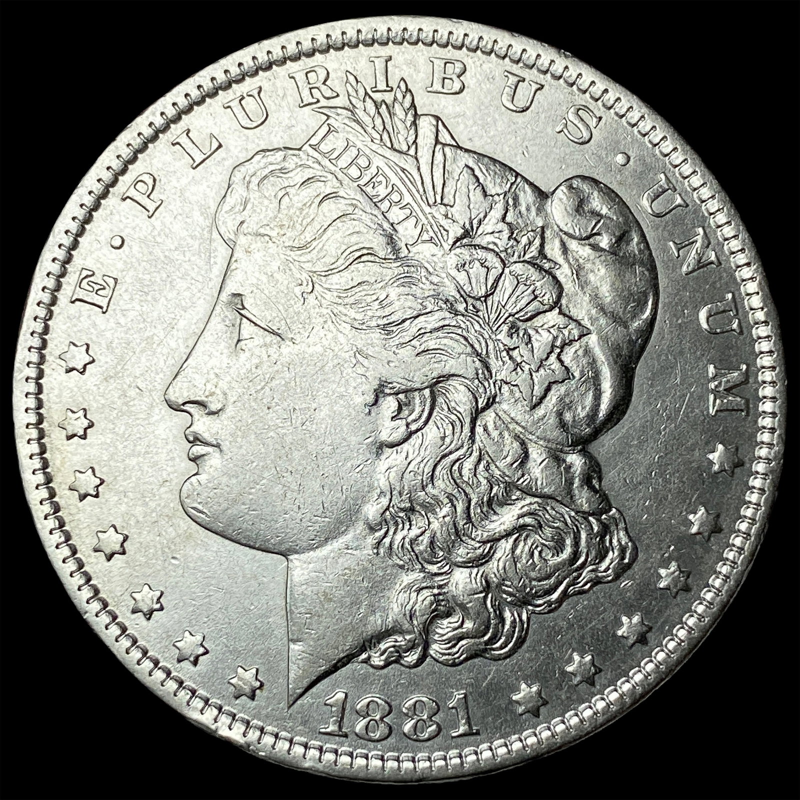 1881-O Silver Morgan Dollar NEARLY UNCIRCULATED (1 of 2)
