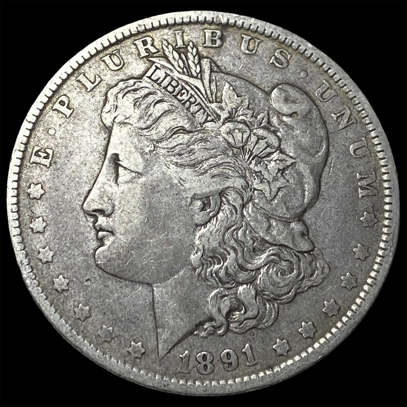 1891-O Silver Morgan Dollar NEARLY UNCIRCULATED (1 of 2)