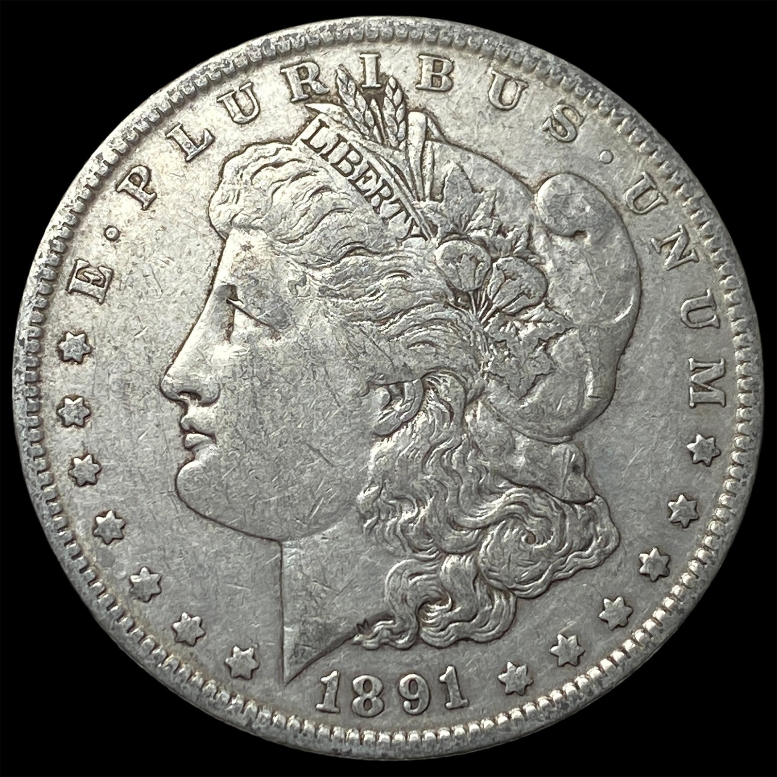 1891-O Silver Morgan Dollar NEARLY UNCIRCULATED (1 of 2)