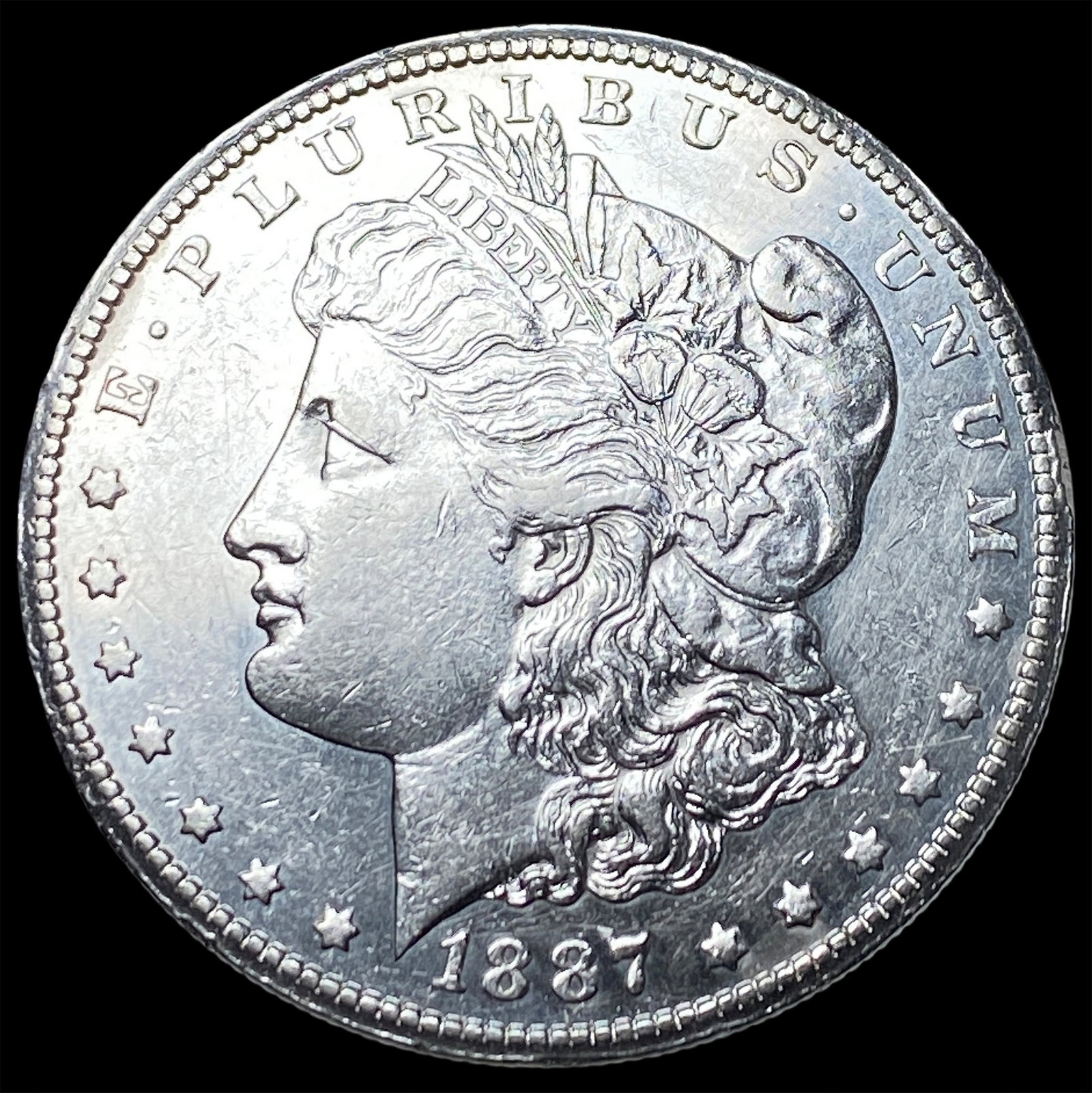 1887 Morgan Silver Dollar CLOSELY UNCIRCULATED: 1887 Morgan Silver Dollar CLOSELY UNCIRCULATED