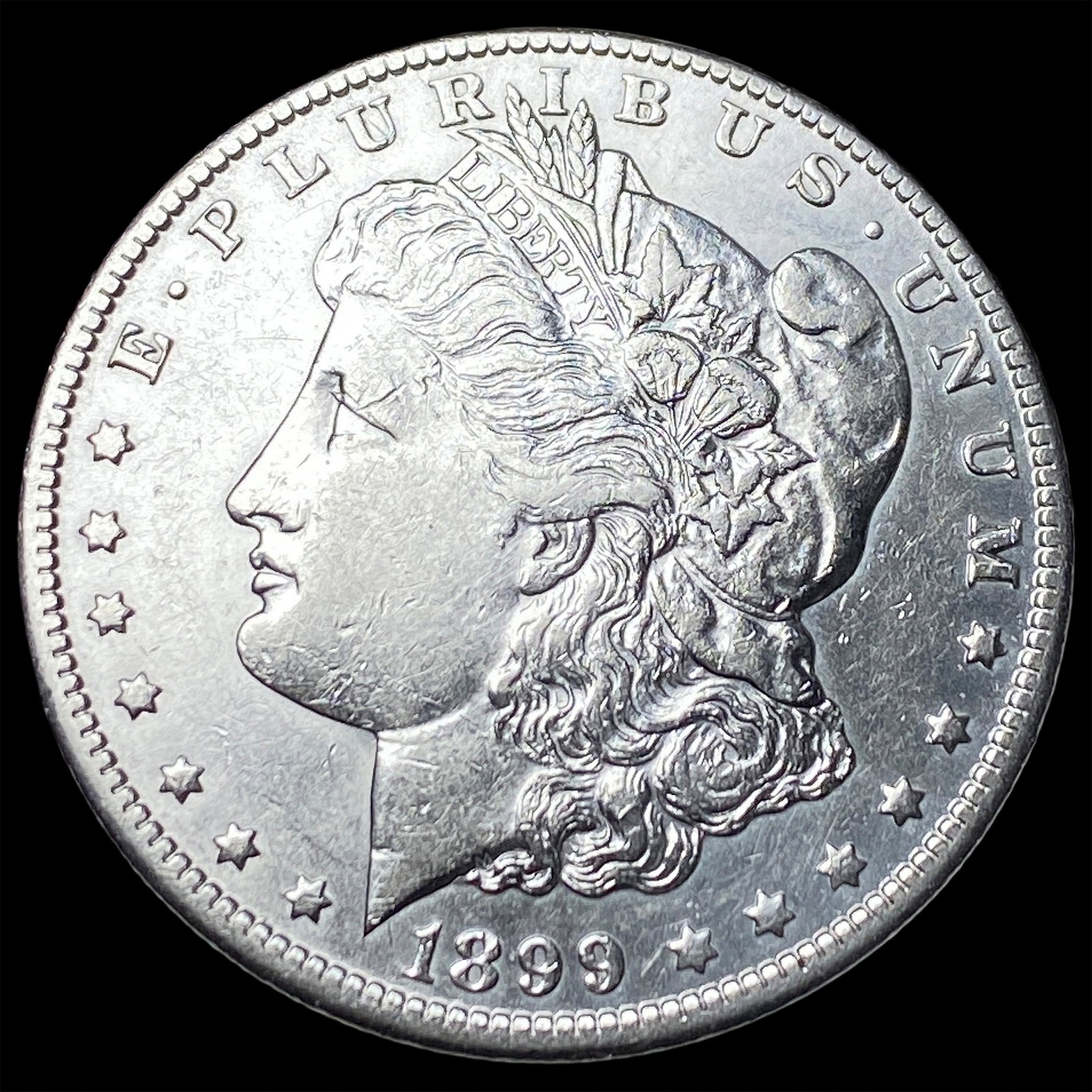 1899 Morgan Silver Dollar CLOSELY UNCIRCULATED (1 of 2)