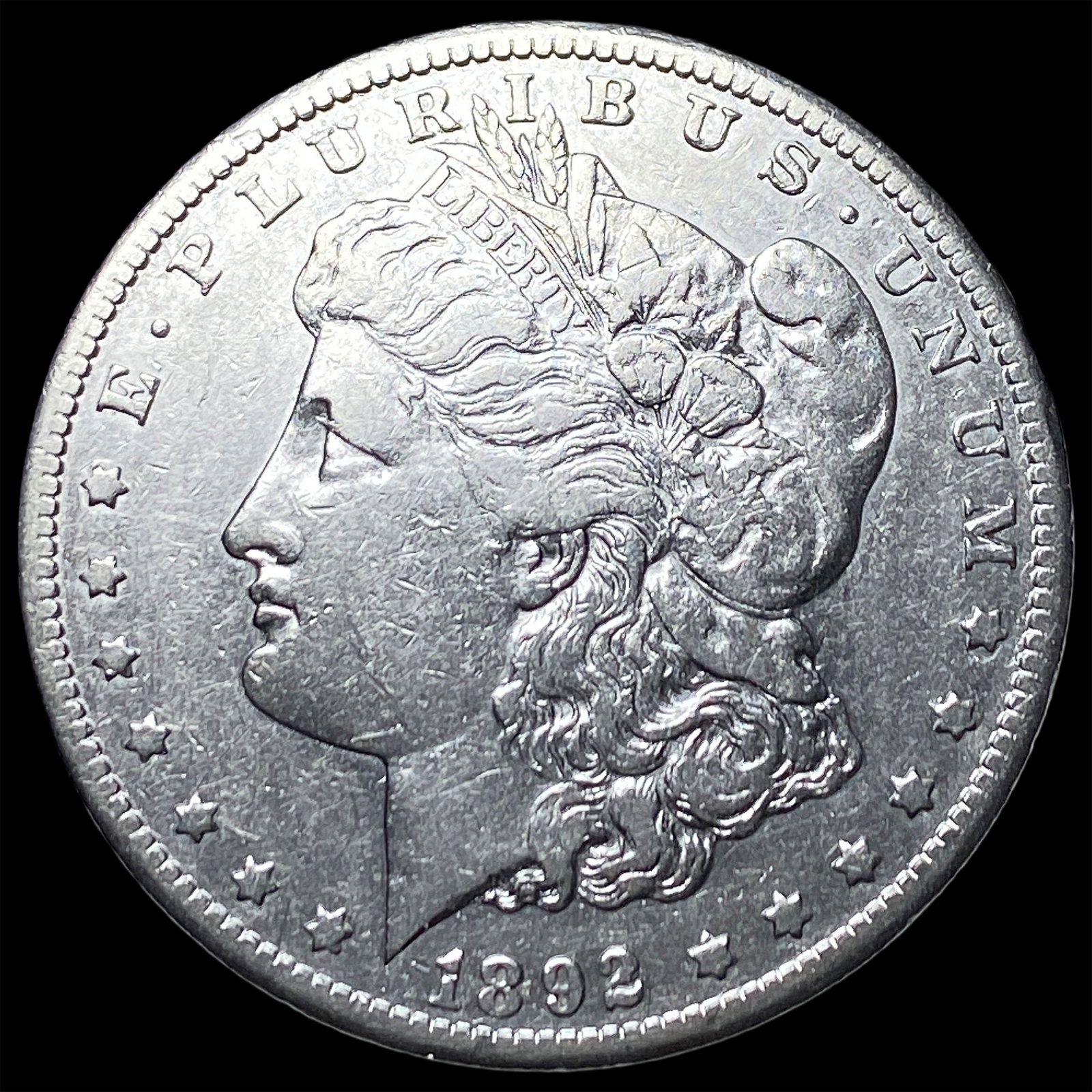 1892-CC Silver Morgan Dollar NEARLY UNCIRCULATED (1 of 2)