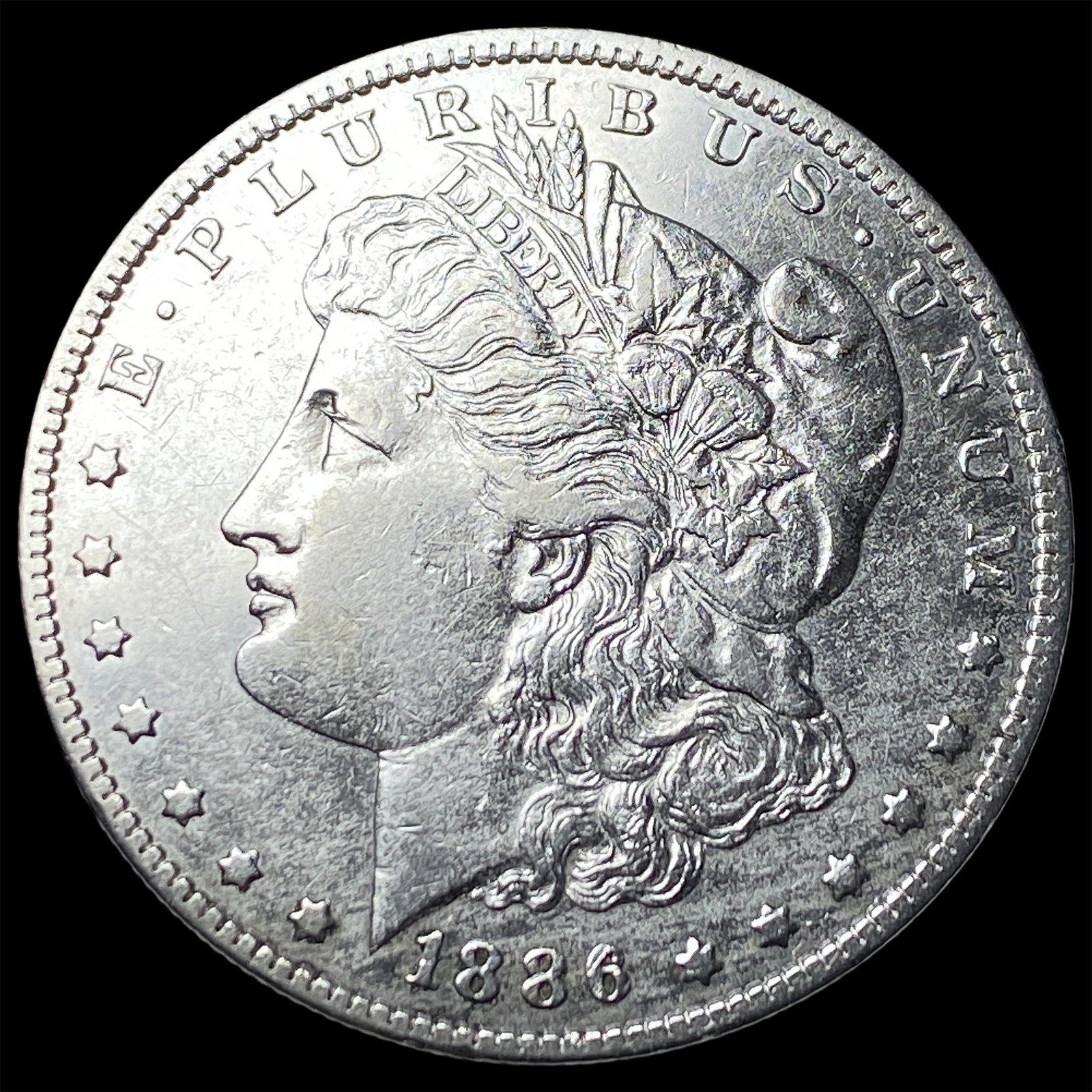 1886 Silver Morgan Dollar CLOSELY UNCIRCULATED: 1886 Silver Morgan Dollar CLOSELY UNCIRCULATED