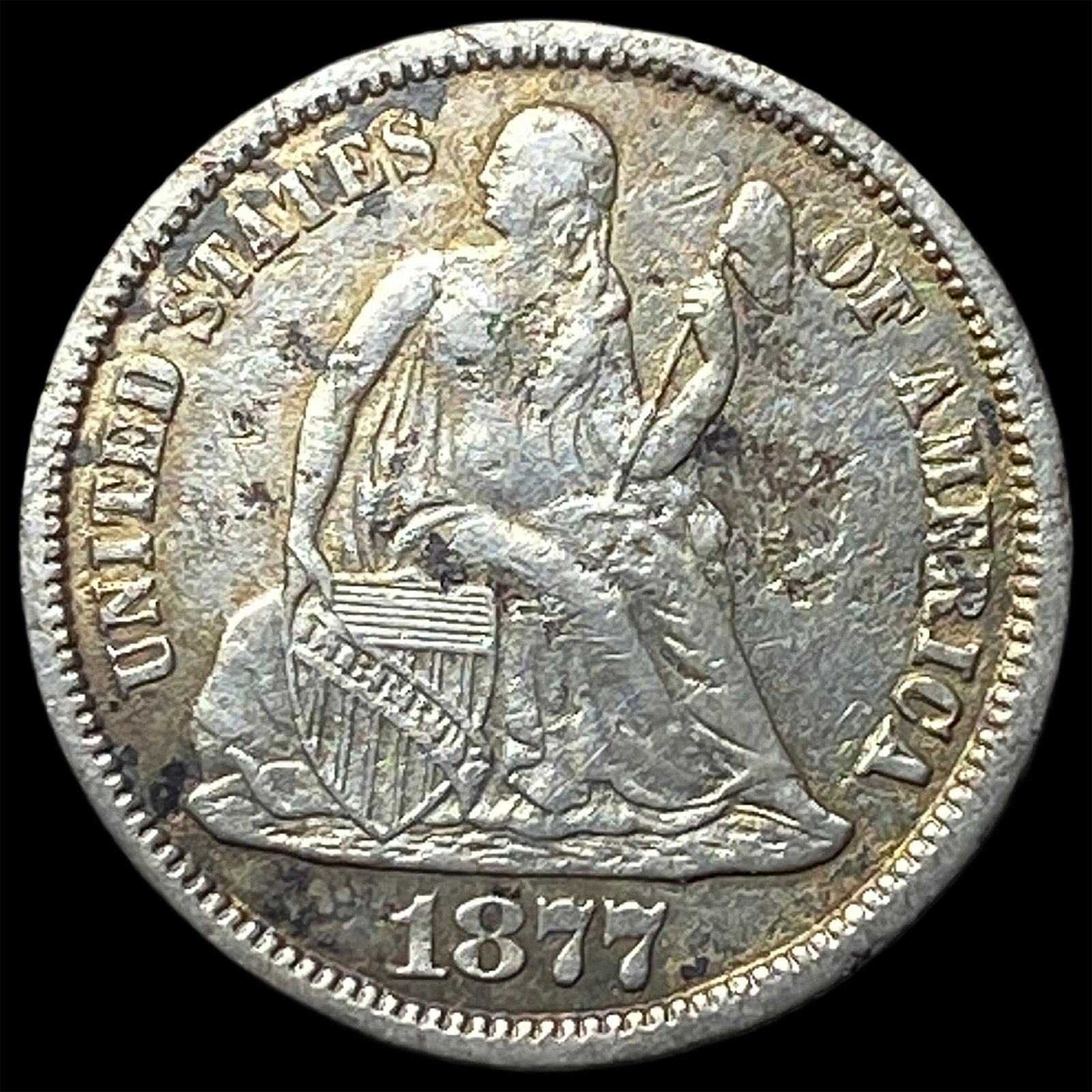 1877-CC Silver Seated Liberty Dime NEARLY UNCIRCULATED (1 of 2)