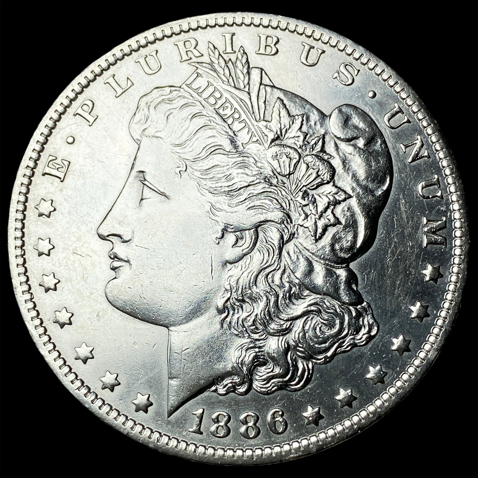 1886-O Silver Morgan Dollar CLOSELY UNCIRCULATED: 1886-O Silver Morgan Dollar CLOSELY UNCIRCULATED