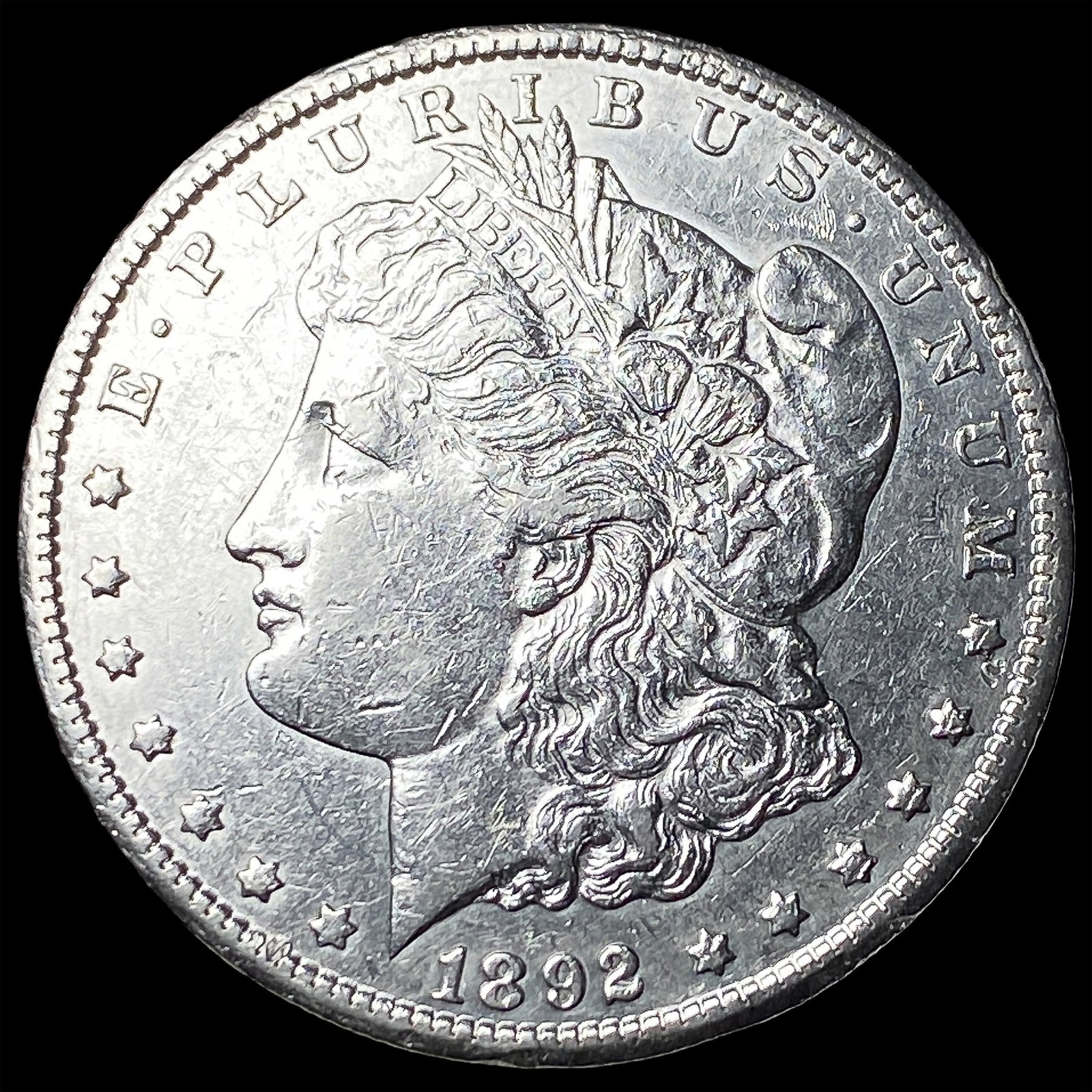 1892-CC Silver Morgan Dollar CLOSELY UNCIRCULATED: 1892-CC Silver Morgan Dollar CLOSELY UNCIRCULATED