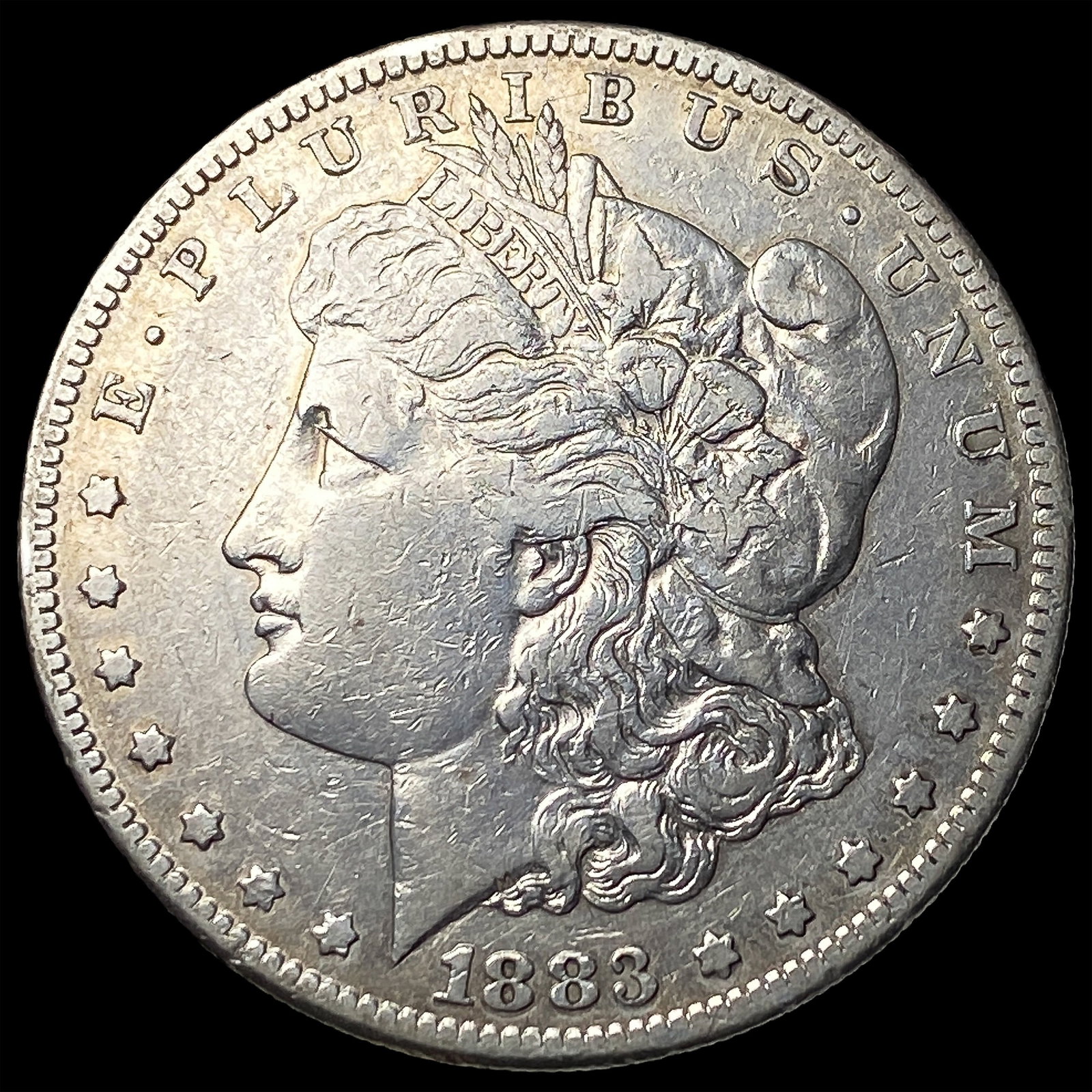 1883-S Morgan Silver Dollar CLOSELY UNCIRCULATED (1 of 2)