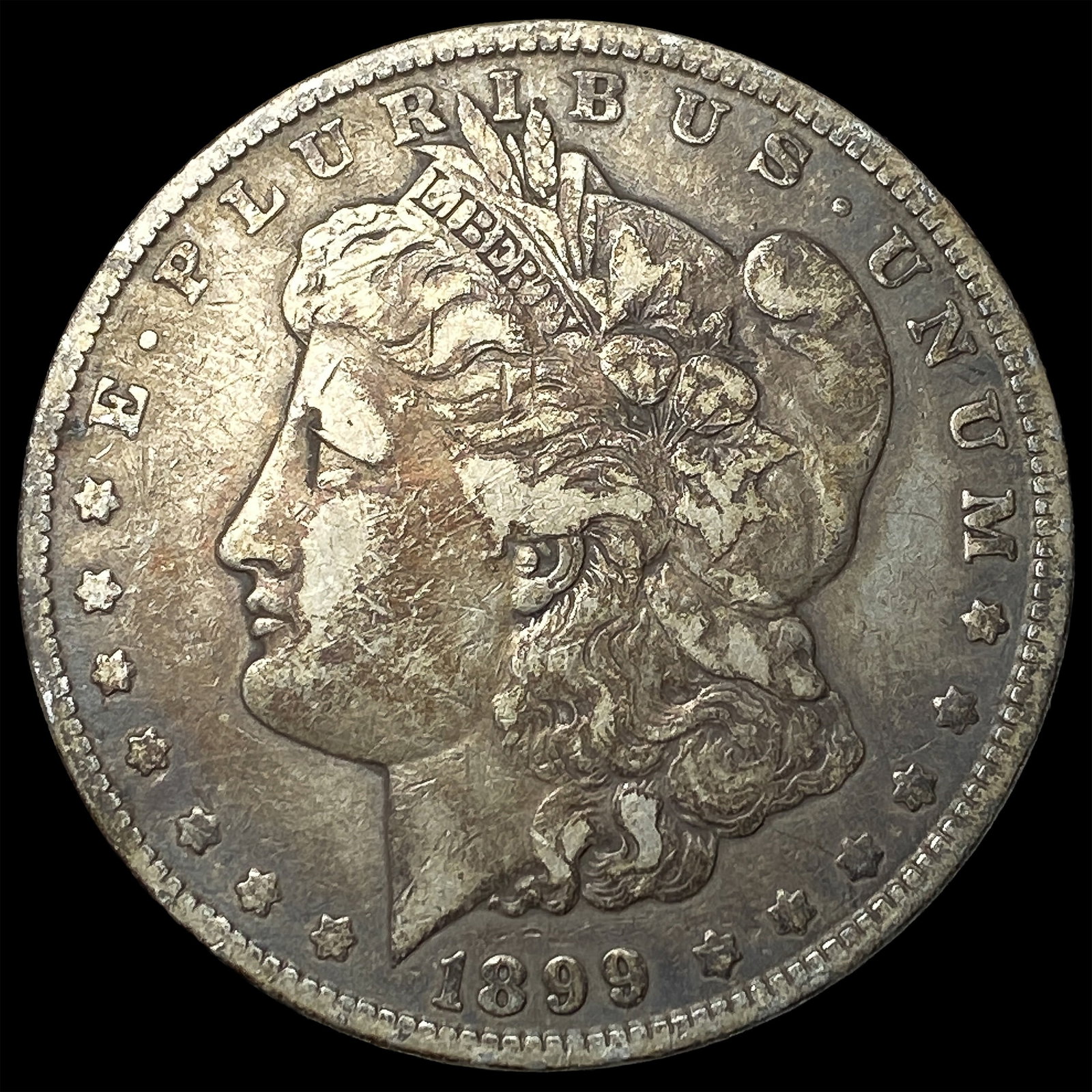 1899 Morgan Silver Dollar NEARLY UNCIRCULATED (1 of 2)