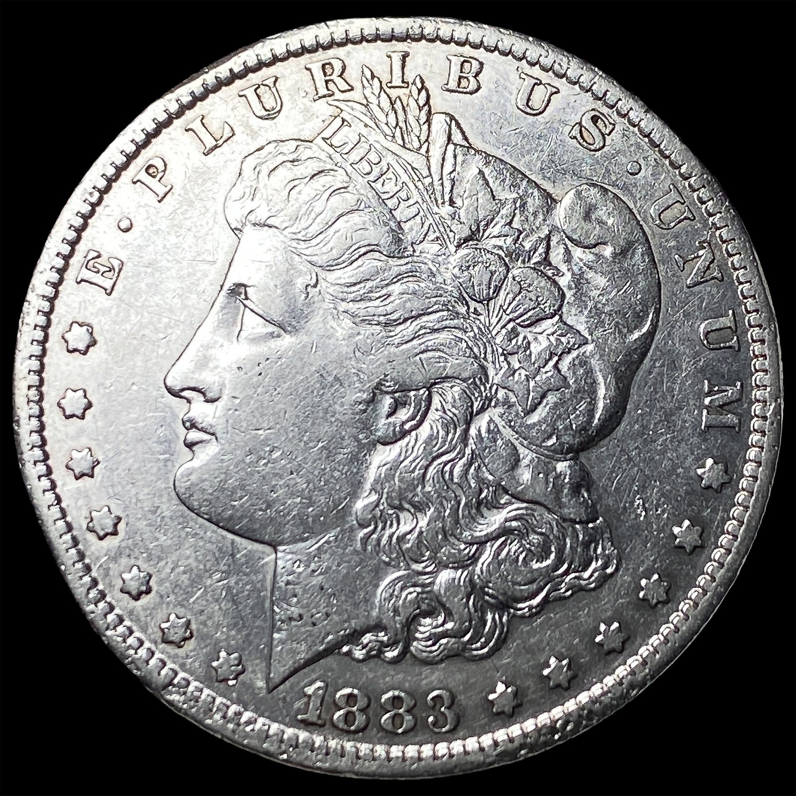 1883-CC Silver Morgan Dollar CLOSELY UNCIRCULATED (1 of 2)
