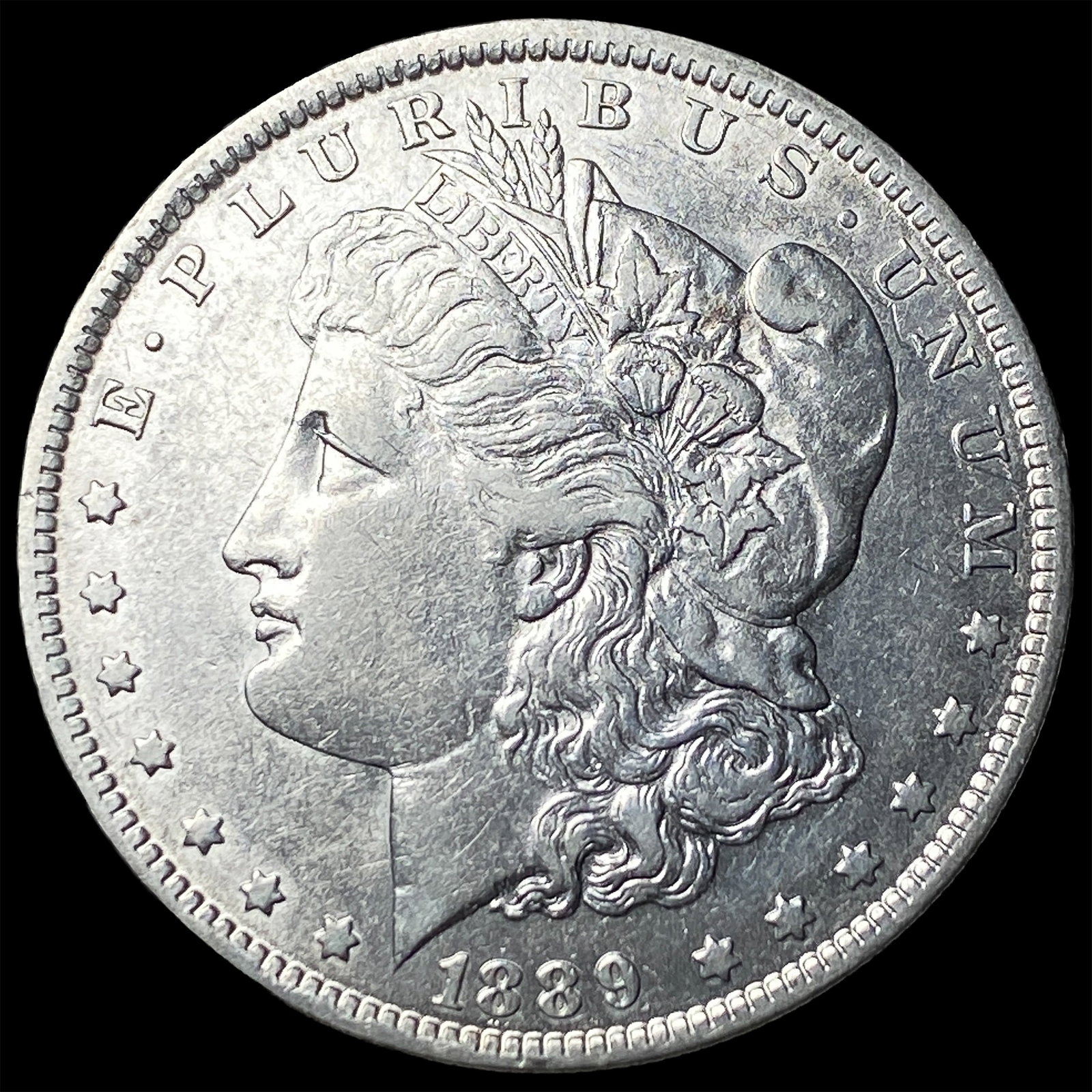 1889-O Morgan Silver Dollar CLOSELY UNCIRCULATED: 1889-O Morgan Silver Dollar CLOSELY UNCIRCULATED