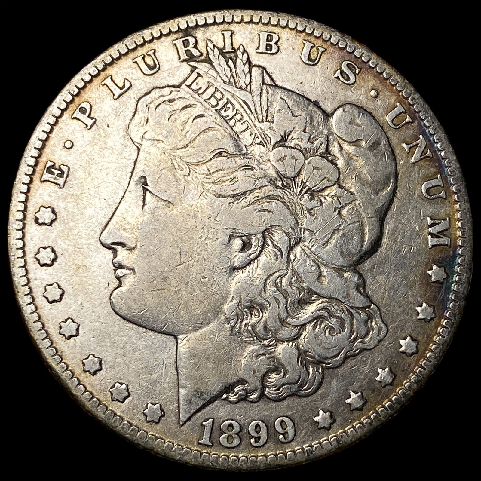 1899 Morgan Silver Dollar ABOUT UNCIRCULATED (1 of 2)