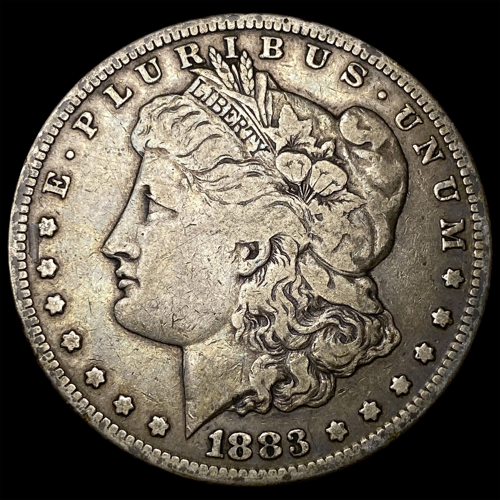 1883-S Silver Morgan Dollar ABOUT UNCIRCULATED: 1883-S Silver Morgan Dollar ABOUT UNCIRCULATED
