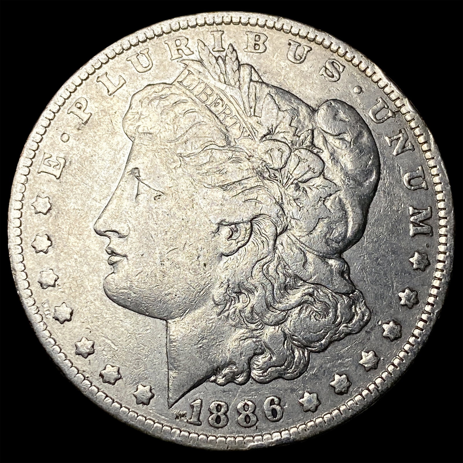 1886-O Silver Morgan Dollar NEARLY UNCIRCULATED: 1886-O Silver Morgan Dollar NEARLY UNCIRCULATED