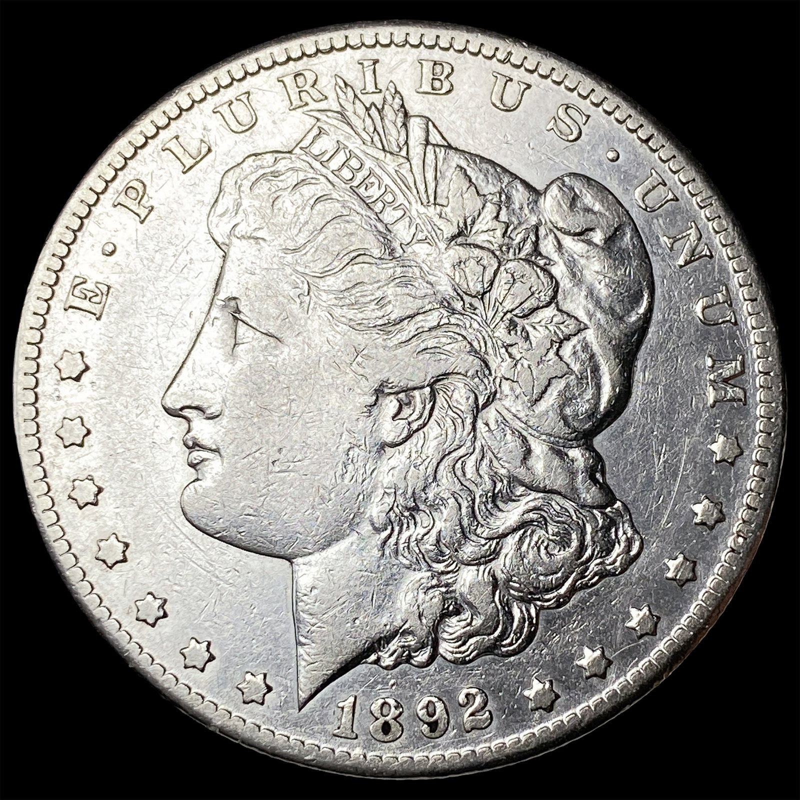 1892-CC Silver Morgan Dollar CLOSELY UNCIRCULATED: 1892-CC Silver Morgan Dollar CLOSELY UNCIRCULATED