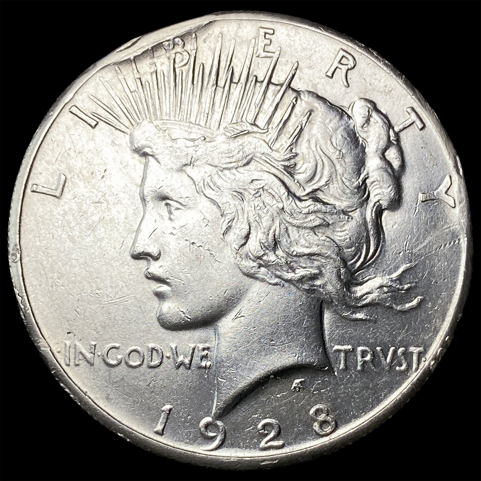 1928 Silver Peace Dollar CLOSELY UNCIRCULATED (1 of 2)