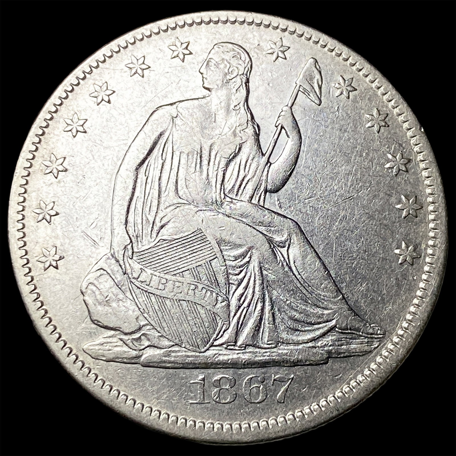 1867 Seated Liberty Half Dollar NEARLY UNCIRCULATED (1 of 2)