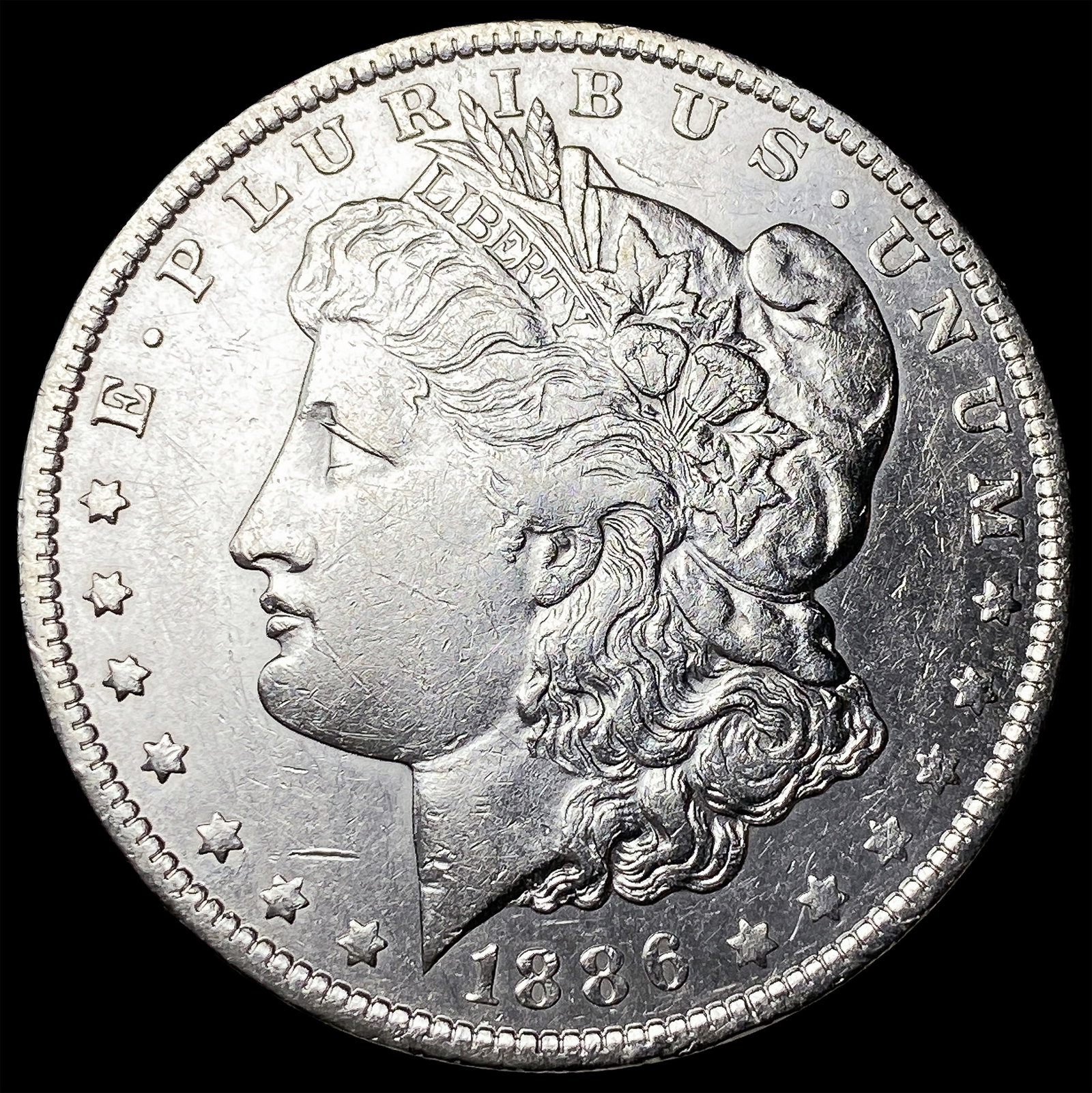 1886-O Silver Morgan Dollar CLOSELY UNCIRCULATED: 1886-O Silver Morgan Dollar CLOSELY UNCIRCULATED