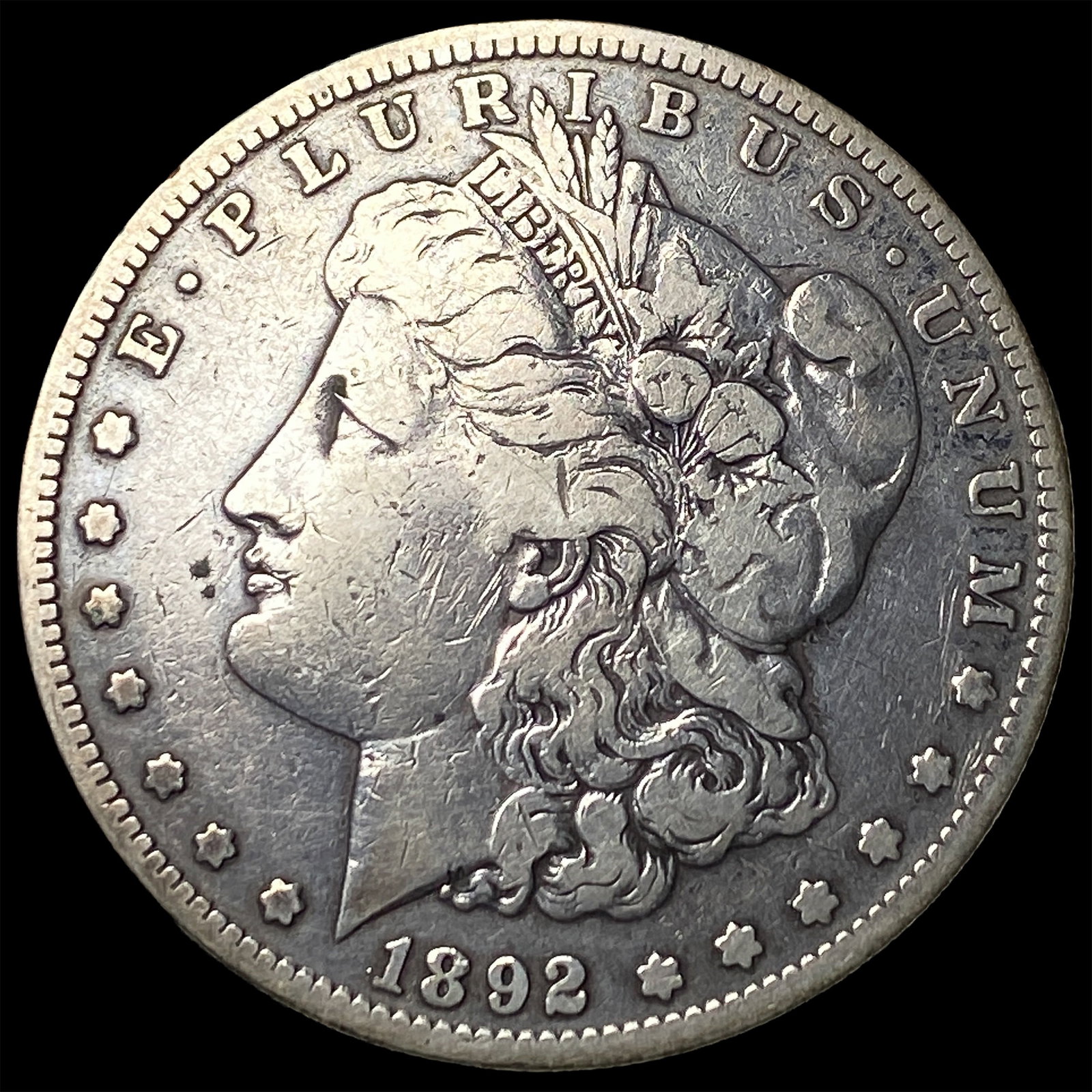 1892-S Morgan Silver Dollar ABOUT UNCIRCULATED: 1892-S Morgan Silver Dollar ABOUT UNCIRCULATED