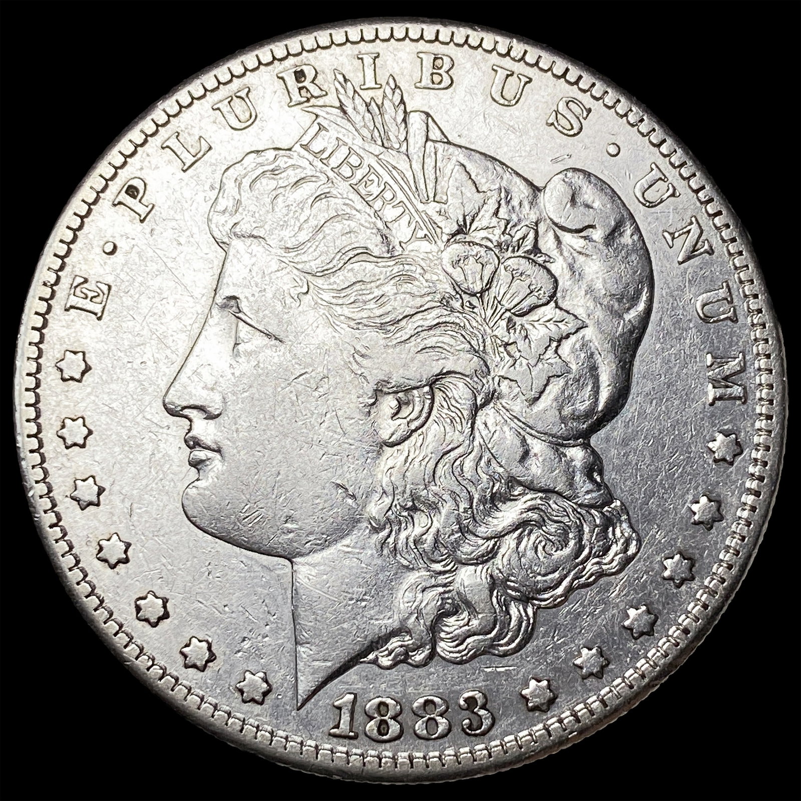 1883-S Morgan Silver Dollar NEARLY UNCIRCULATED (1 of 2)