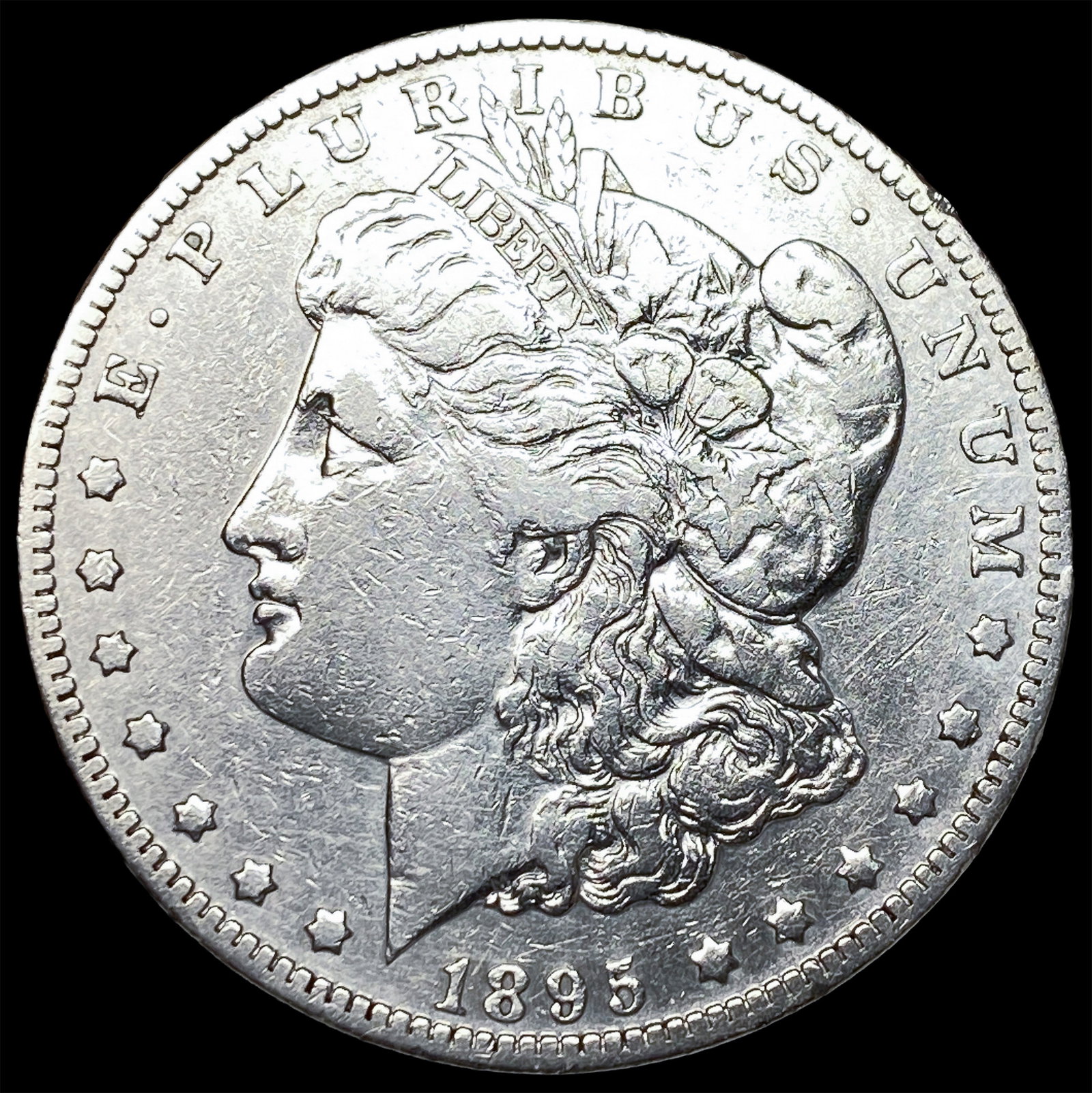 1895-O Silver Morgan Dollar NEARLY UNCIRCULATED (1 of 2)