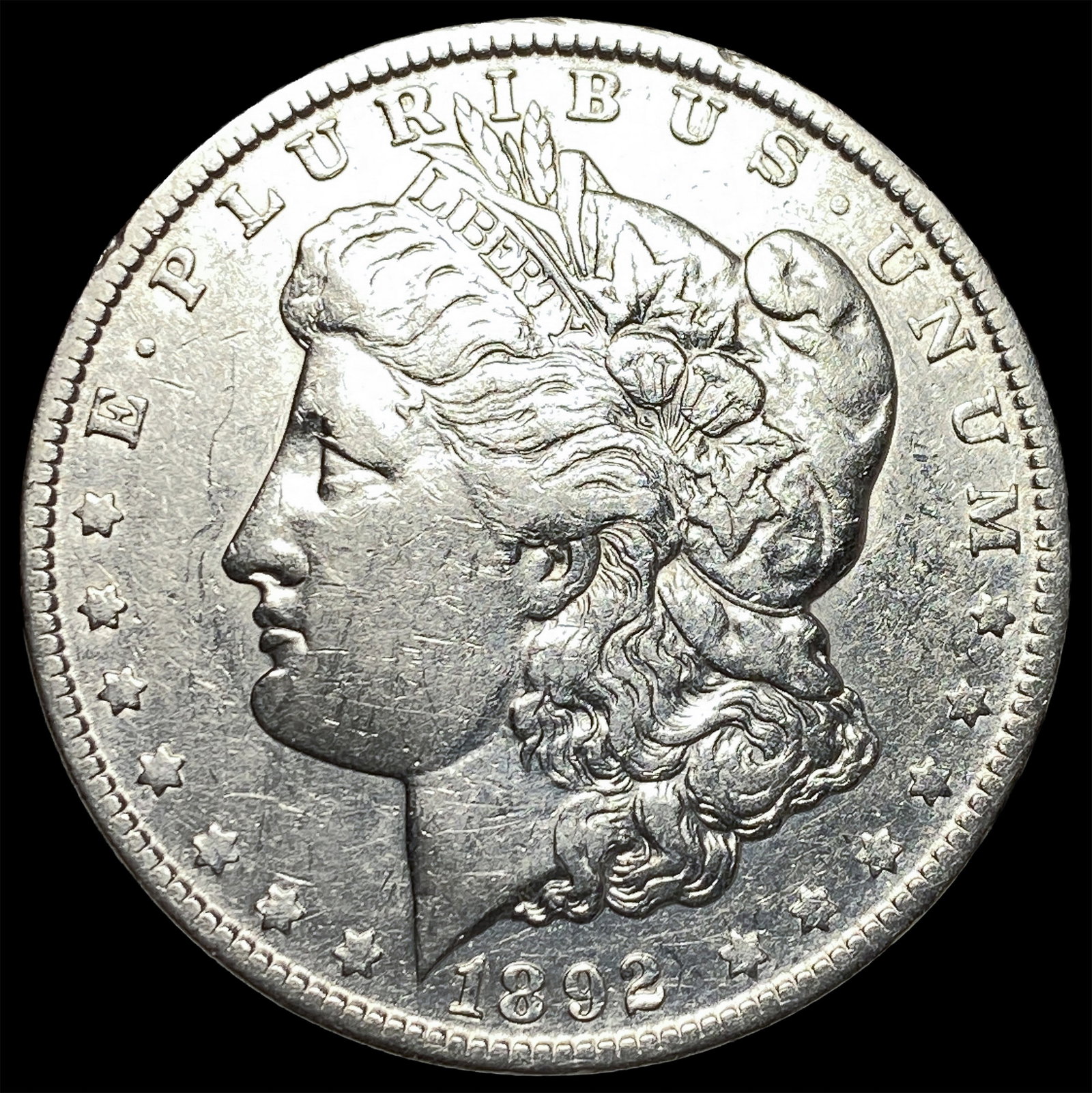 1892-O Silver Morgan Dollar NEARLY UNCIRCULATED (1 of 2)