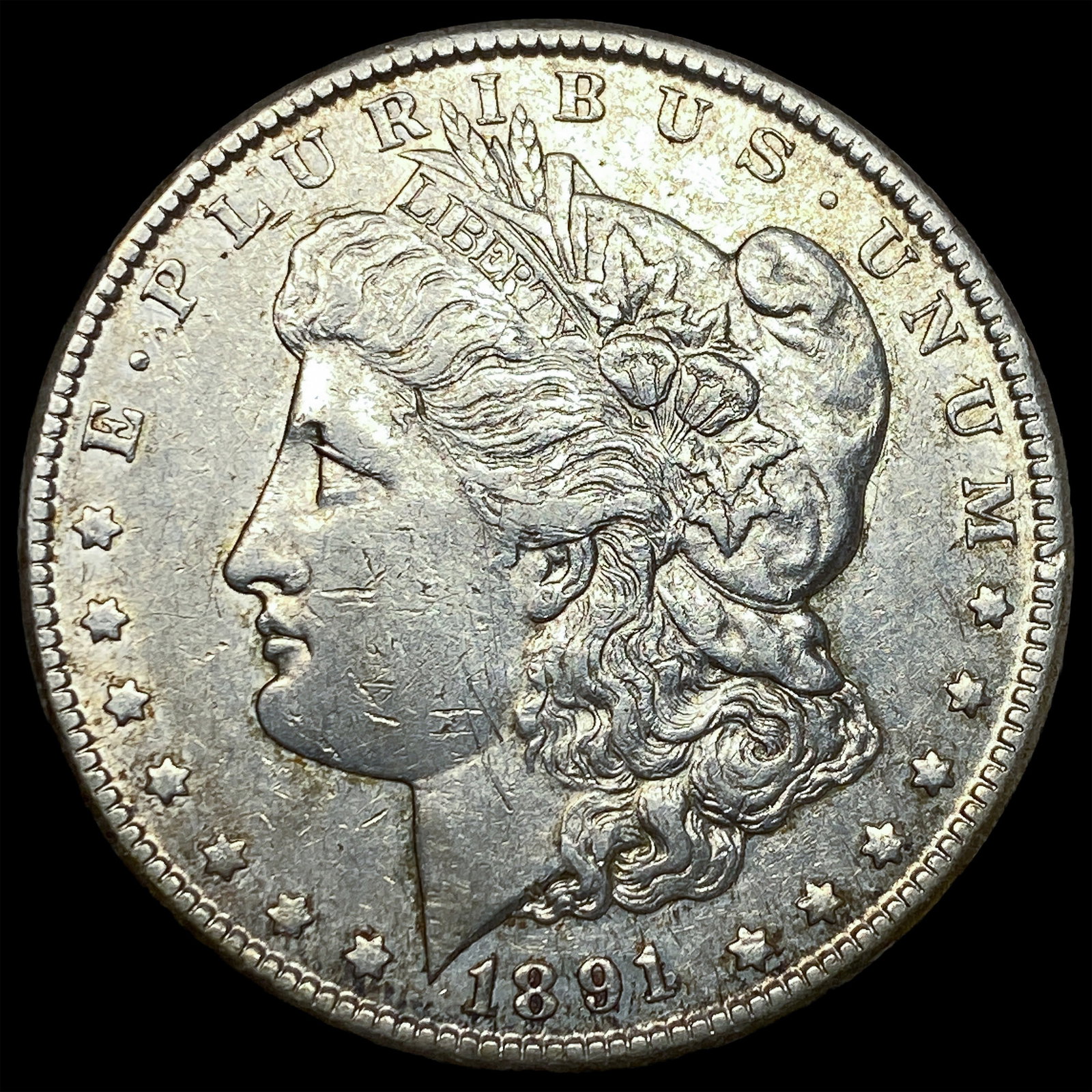 1891-CC Silver Morgan Dollar NEARLY UNCIRCULATED (1 of 2)