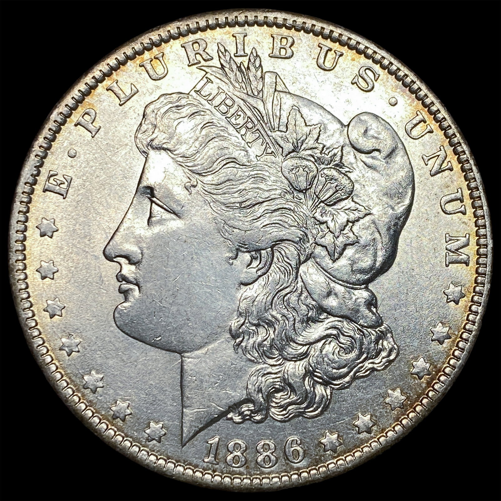 1886-O Silver Morgan Dollar CLOSELY UNCIRCULATED (1 of 2)