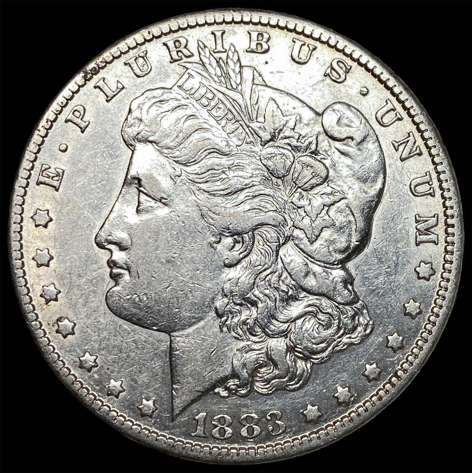 1883-O Silver Morgan Dollar CLOSELY UNCIRCULATED (1 of 2)