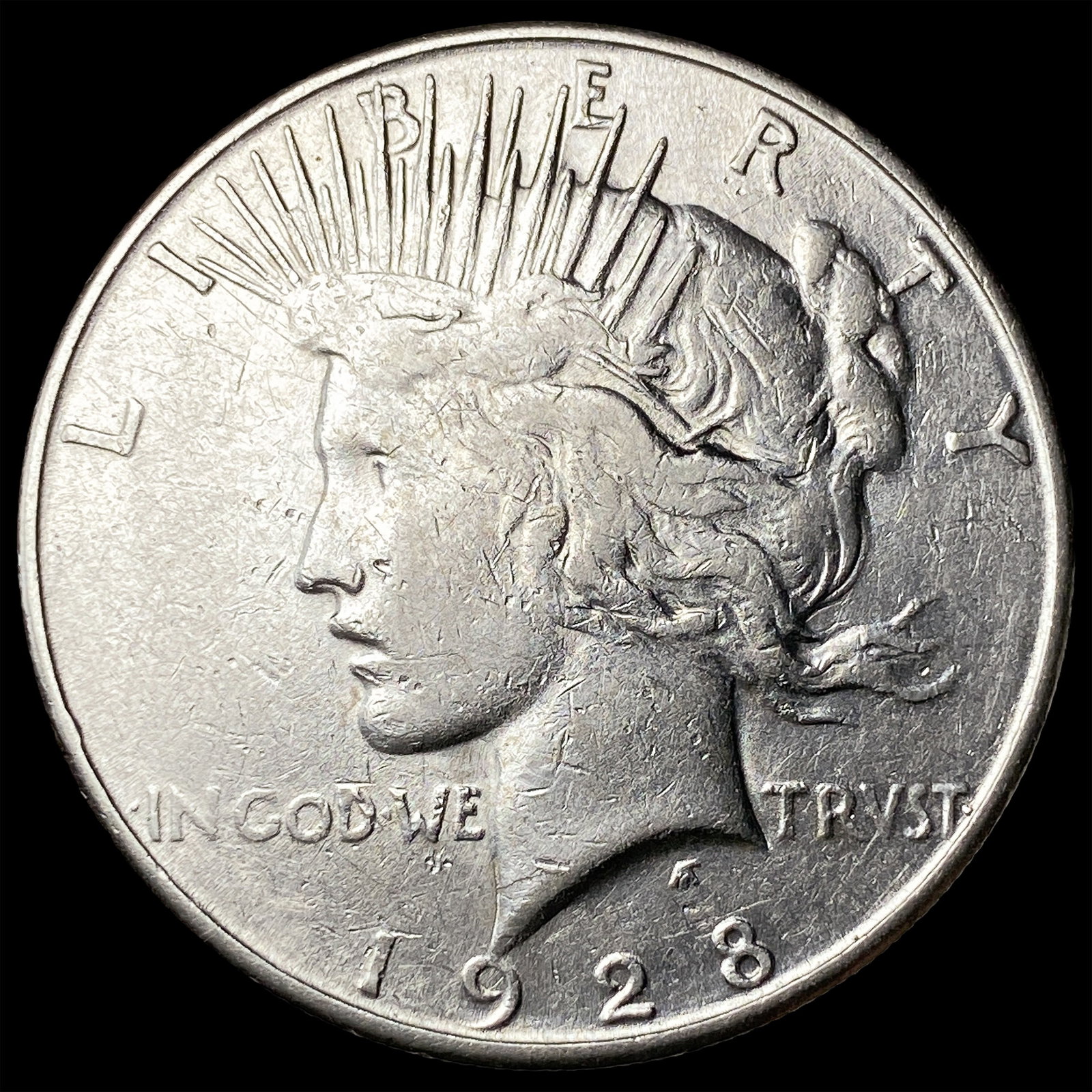 1928 Peace Silver Dollar ABOUT UNCIRCULATED (1 of 2)