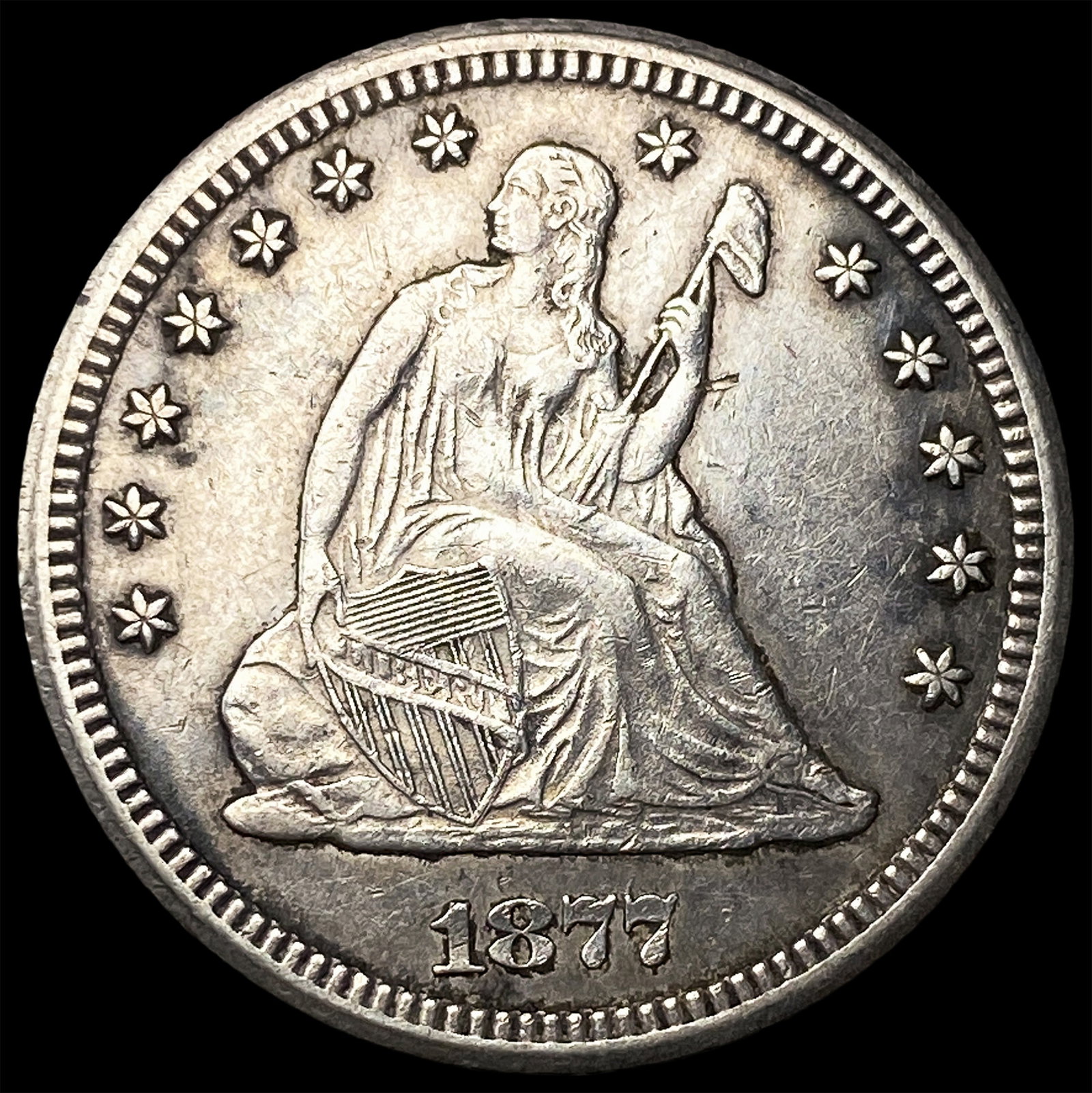 1877-CC Silver Seated Liberty Quarter CLOSELY UNCIRCULATED (1 of 2)