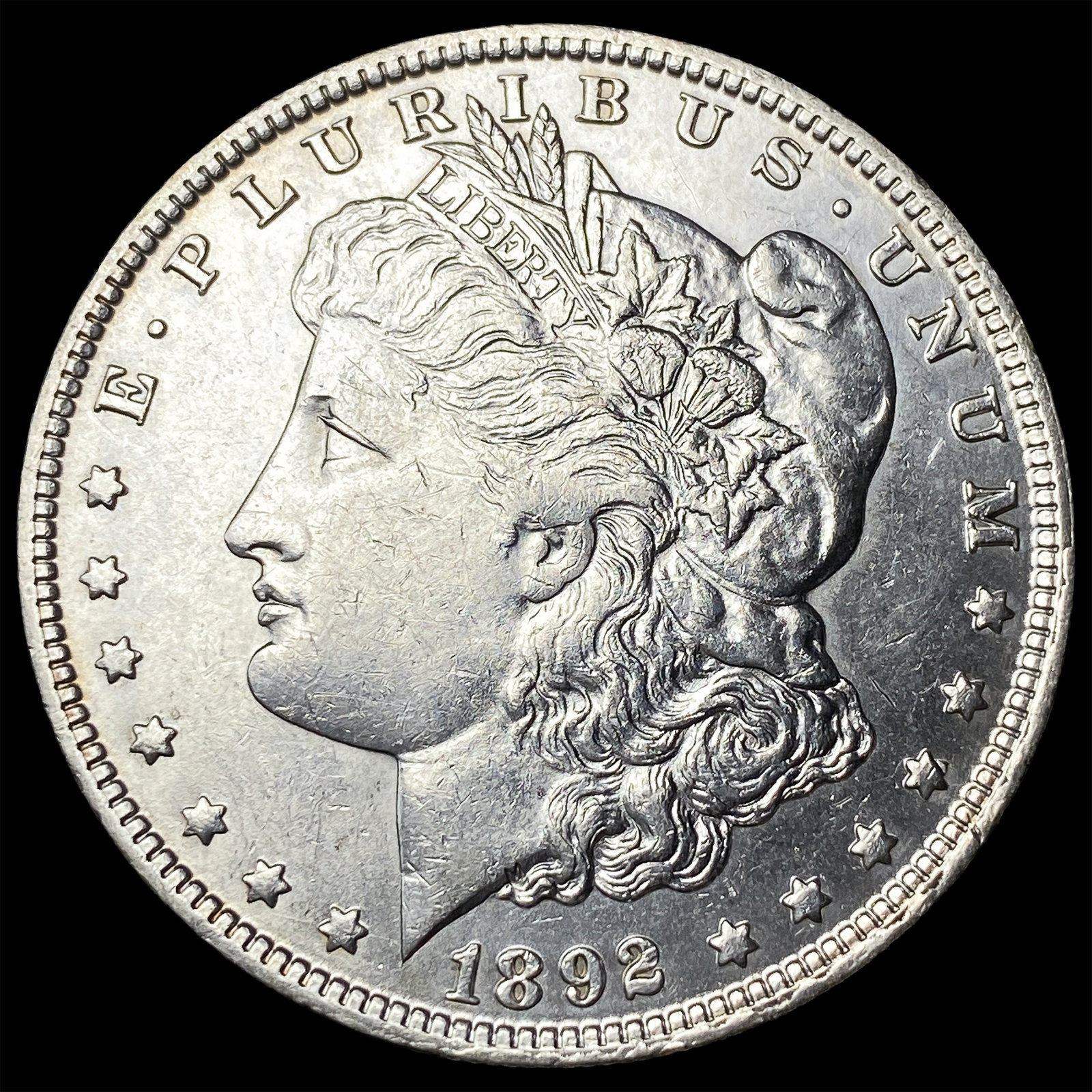 1892-O Silver Morgan Dollar CLOSELY UNCIRCULATED (1 of 2)