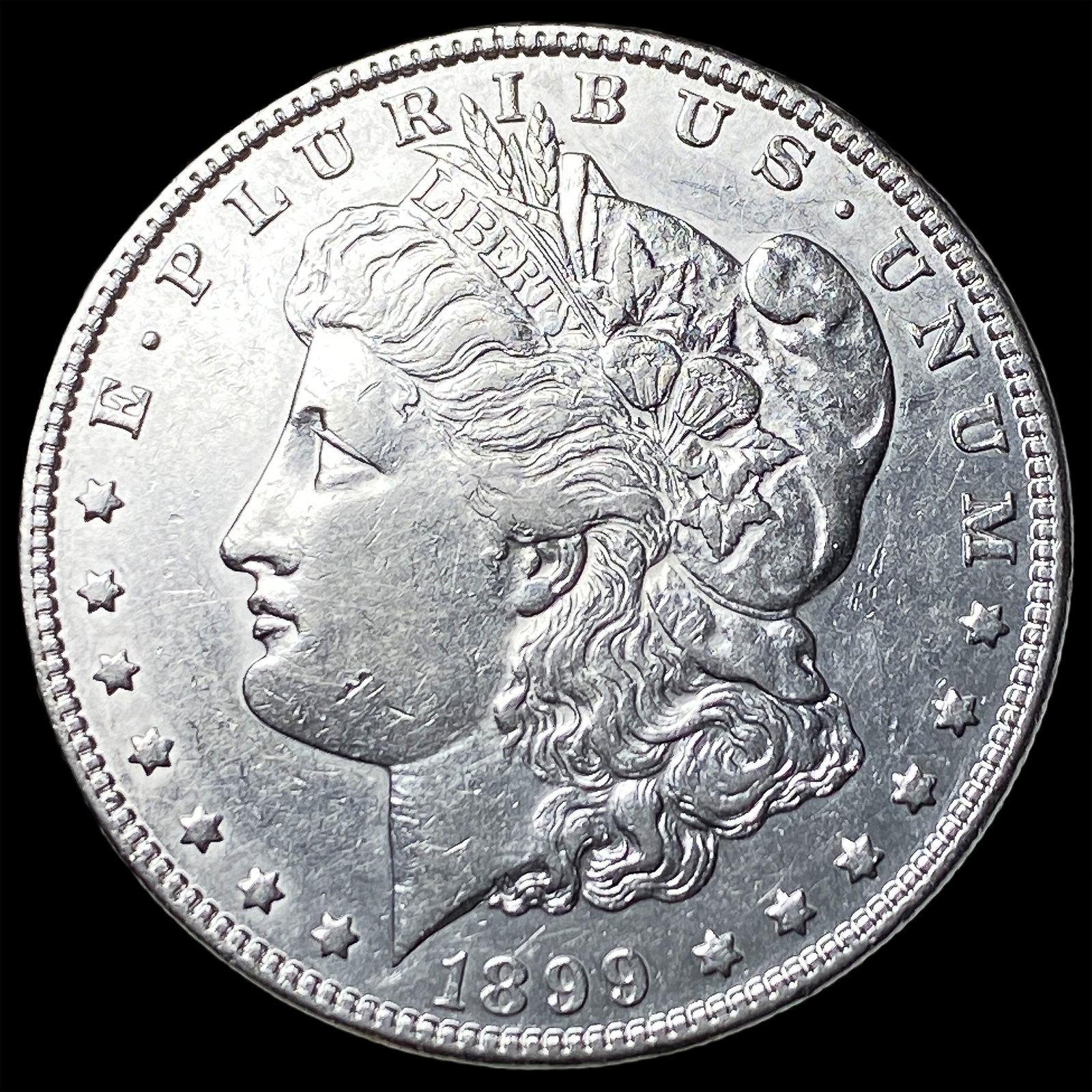 1899 Morgan Silver Dollar CLOSELY UNCIRCULATED: 1899 Morgan Silver Dollar CLOSELY UNCIRCULATED