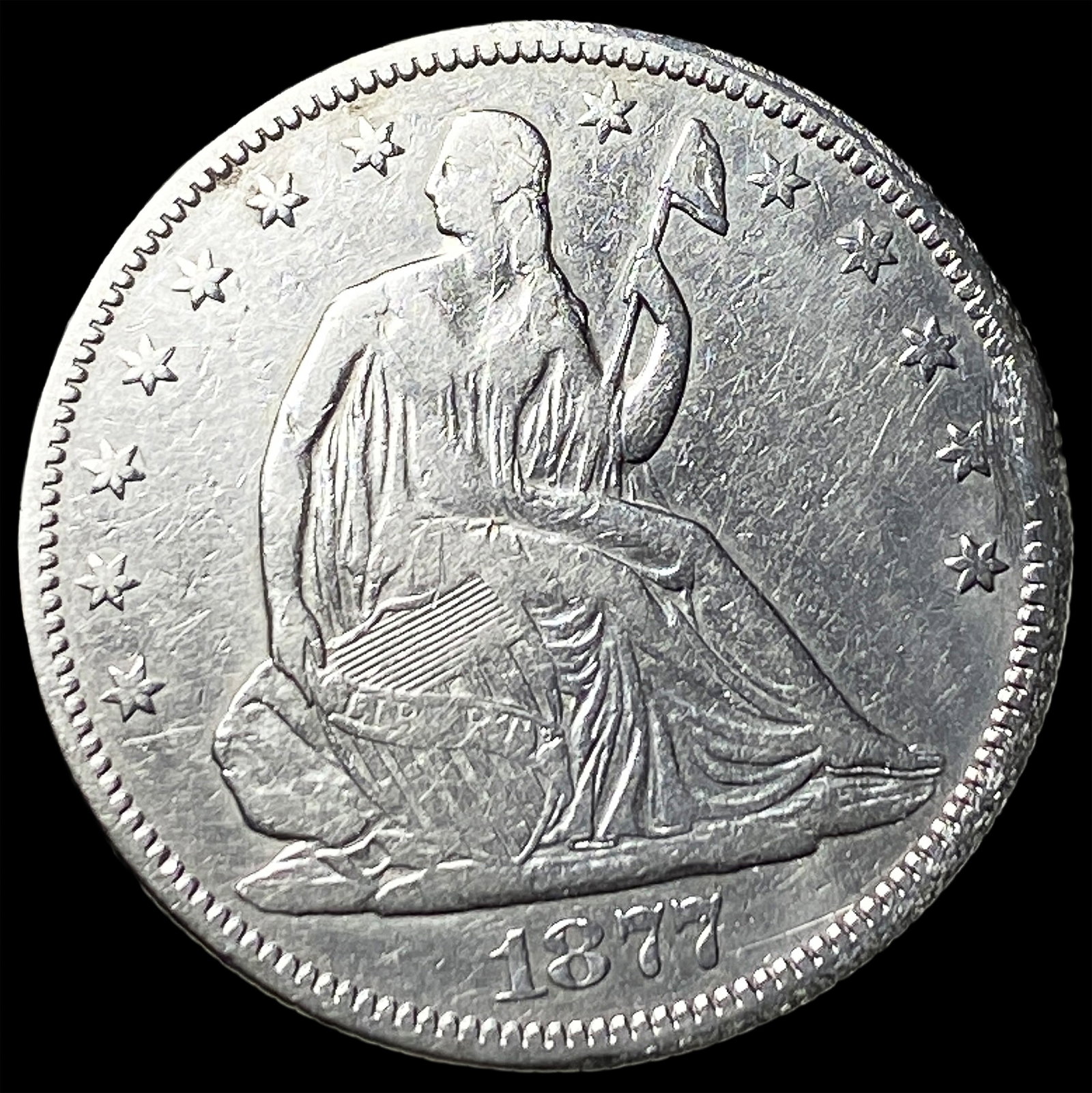 1877 Seated Liberty Half Dollar ABOUT UNCIRCULATED (1 of 2)